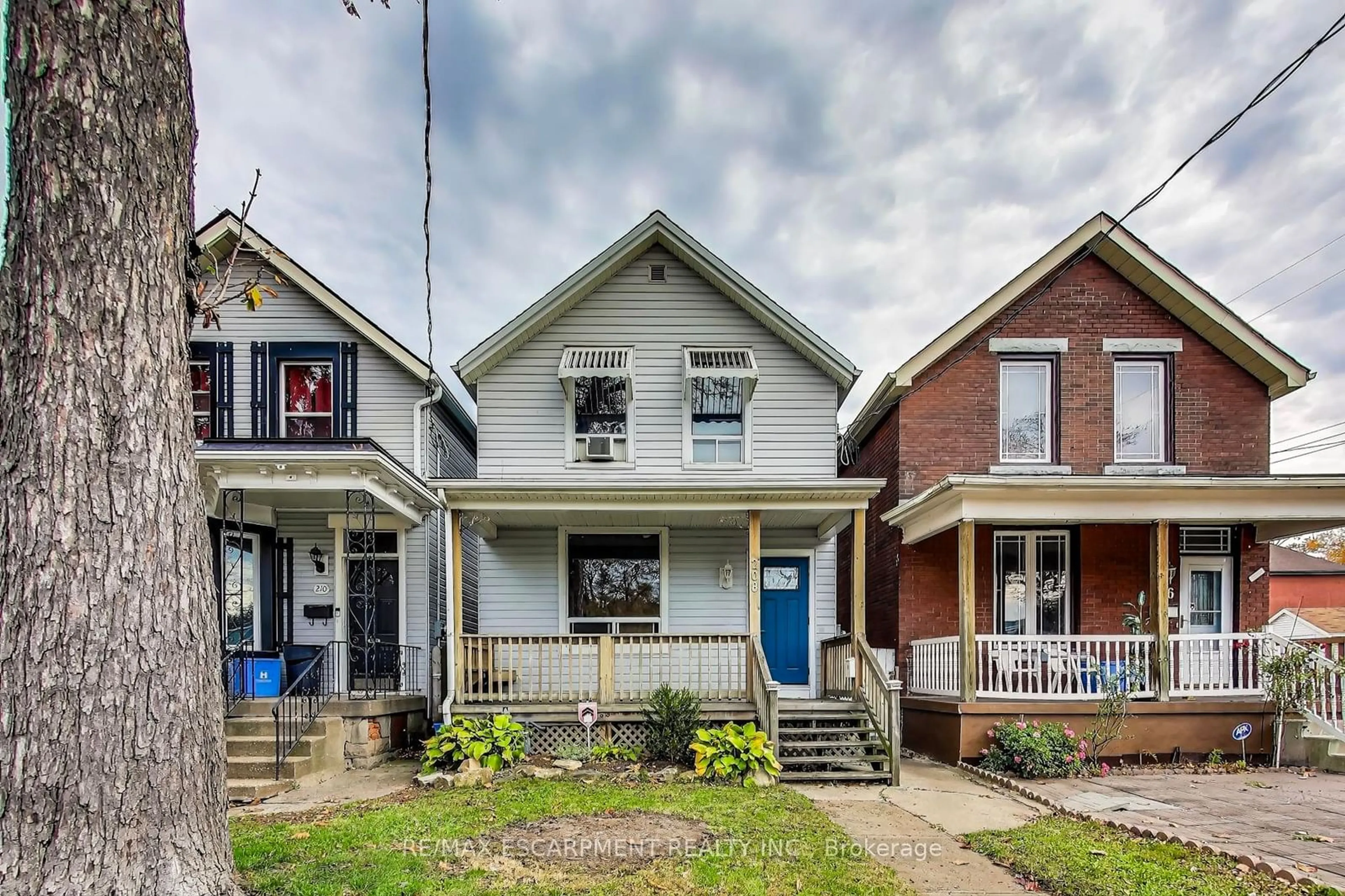 Frontside or backside of a home, the street view for 208 East Ave, Hamilton Ontario L8L 5J3