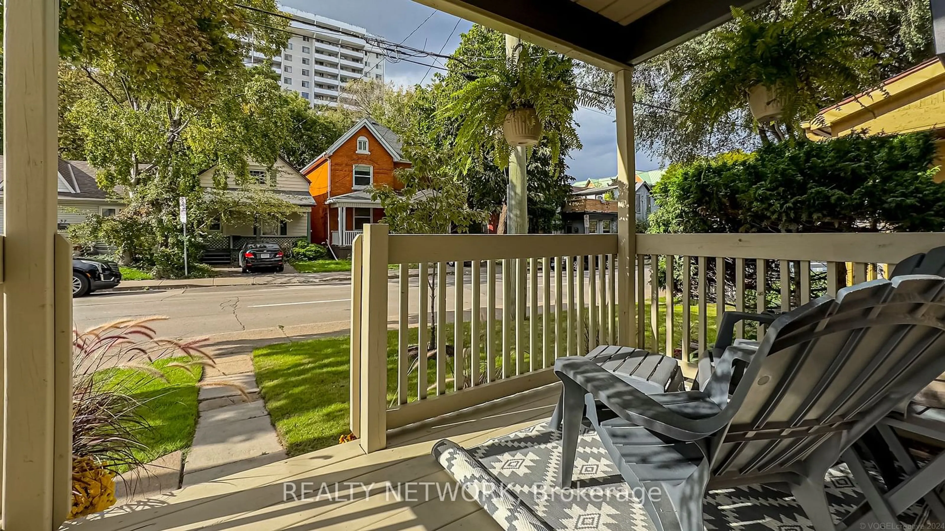 A pic from exterior of the house or condo, the fenced backyard for 40 Hess St, Hamilton Ontario L8R 2S7