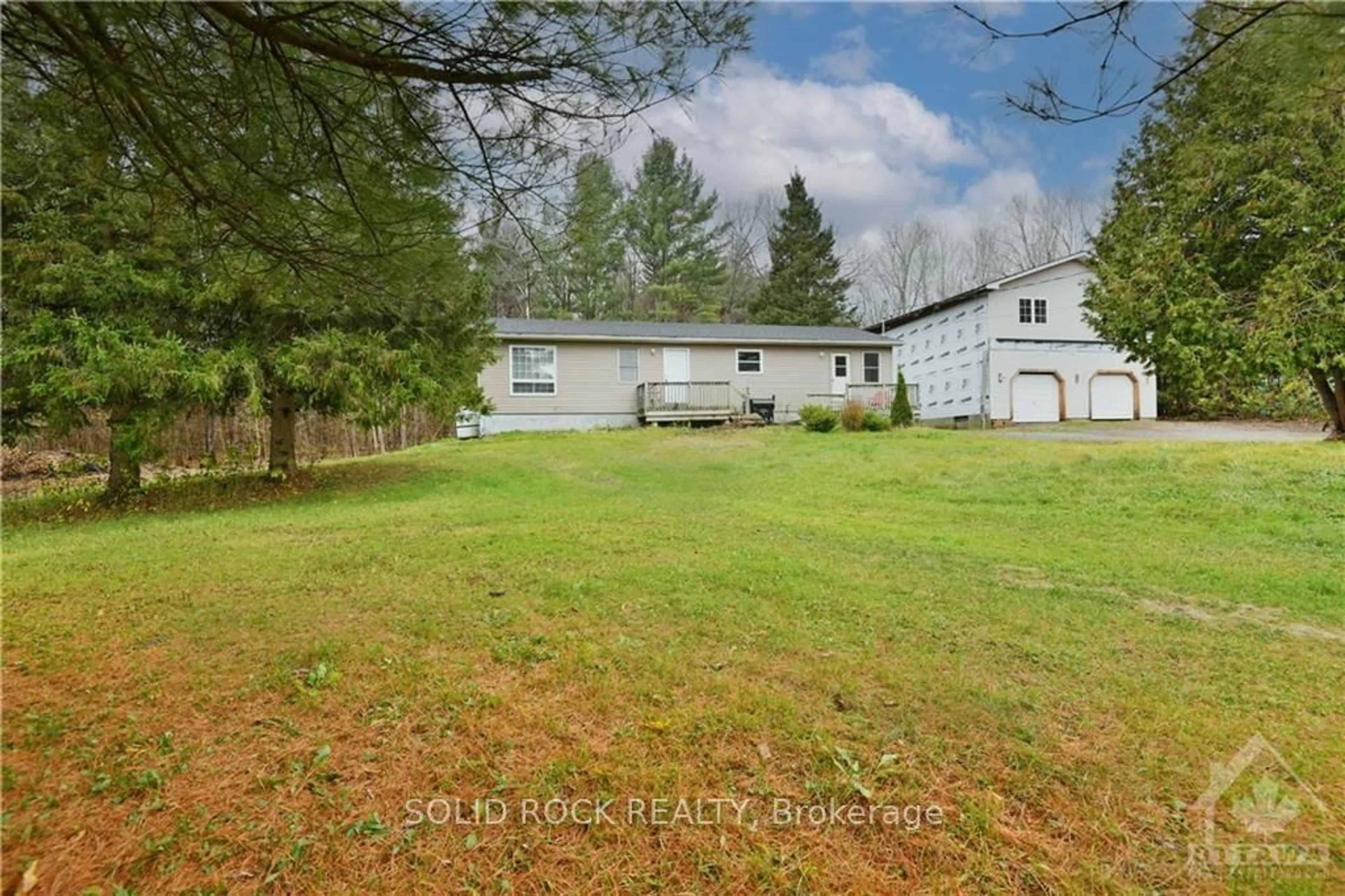 Frontside or backside of a home, the fenced backyard for 4207 LIMESTONE Rd, Carp - Dunrobin - Huntley - Fitzroy and Area Ontario K0A 2H0