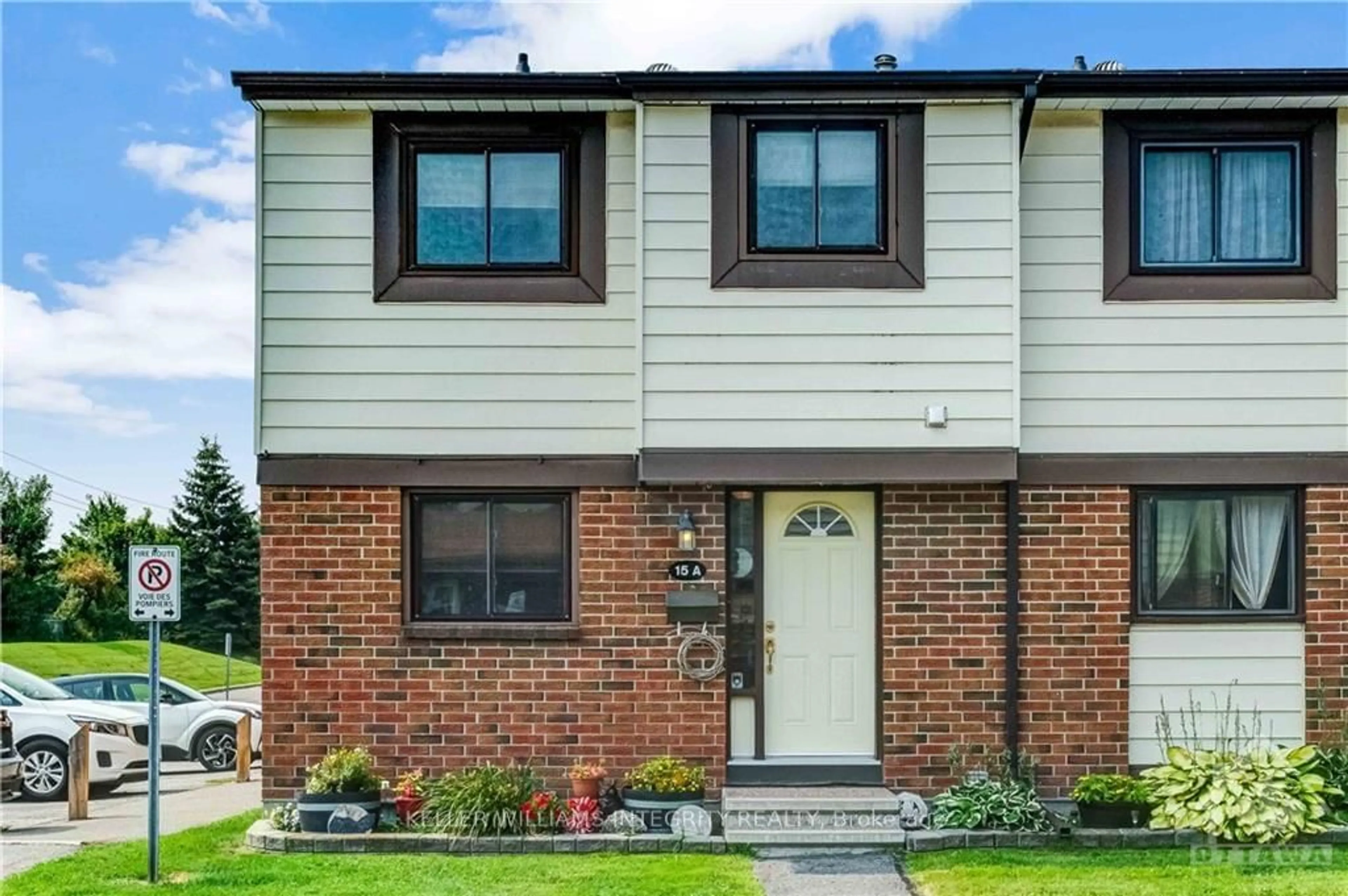 Home with brick exterior material for 15 FOXHILL Way #A, Barrhaven Ontario K2J 1P3