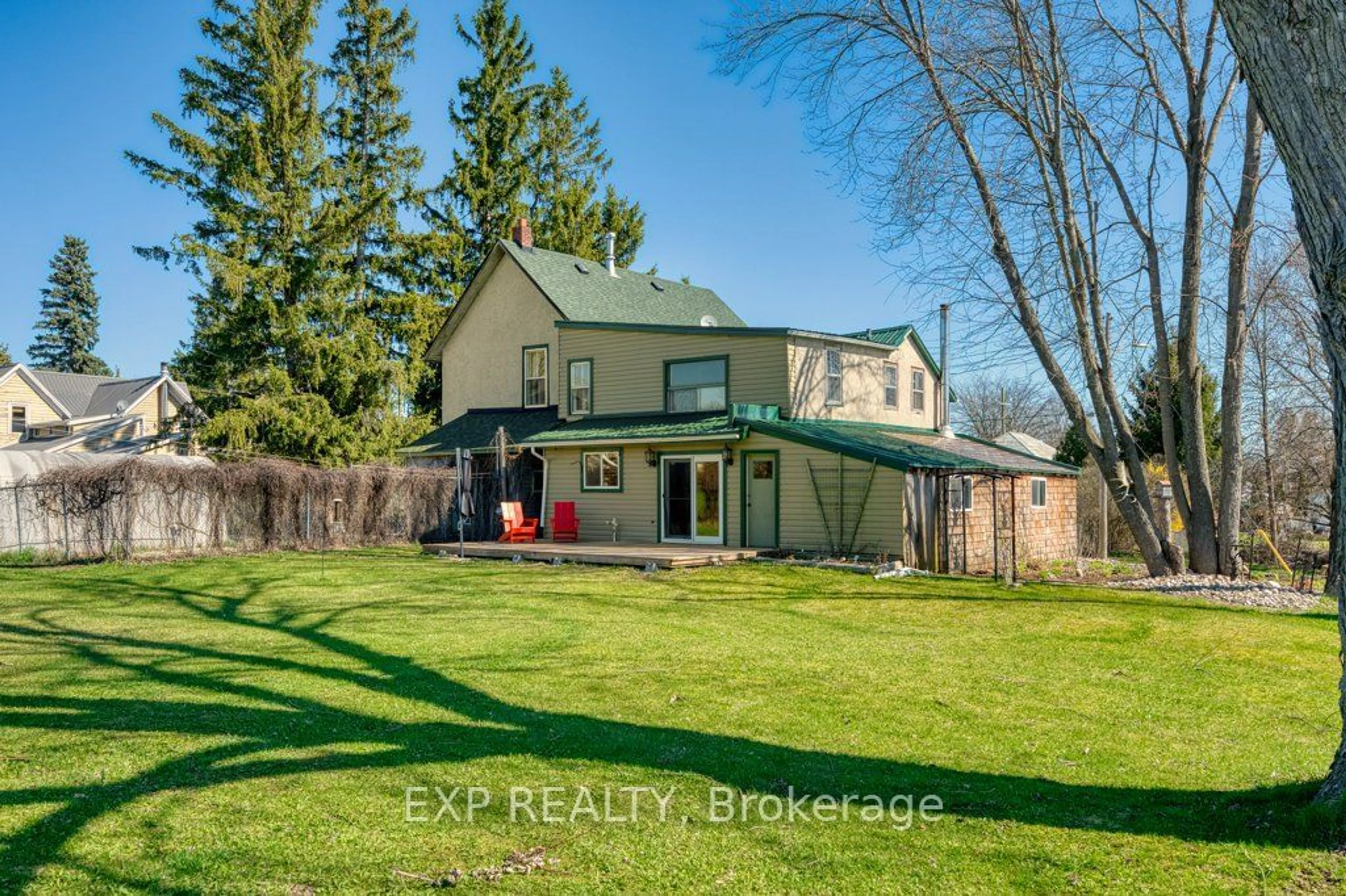 Frontside or backside of a home, the fenced backyard for 3 Bond St, Stone Mills Ontario K0K 3G0