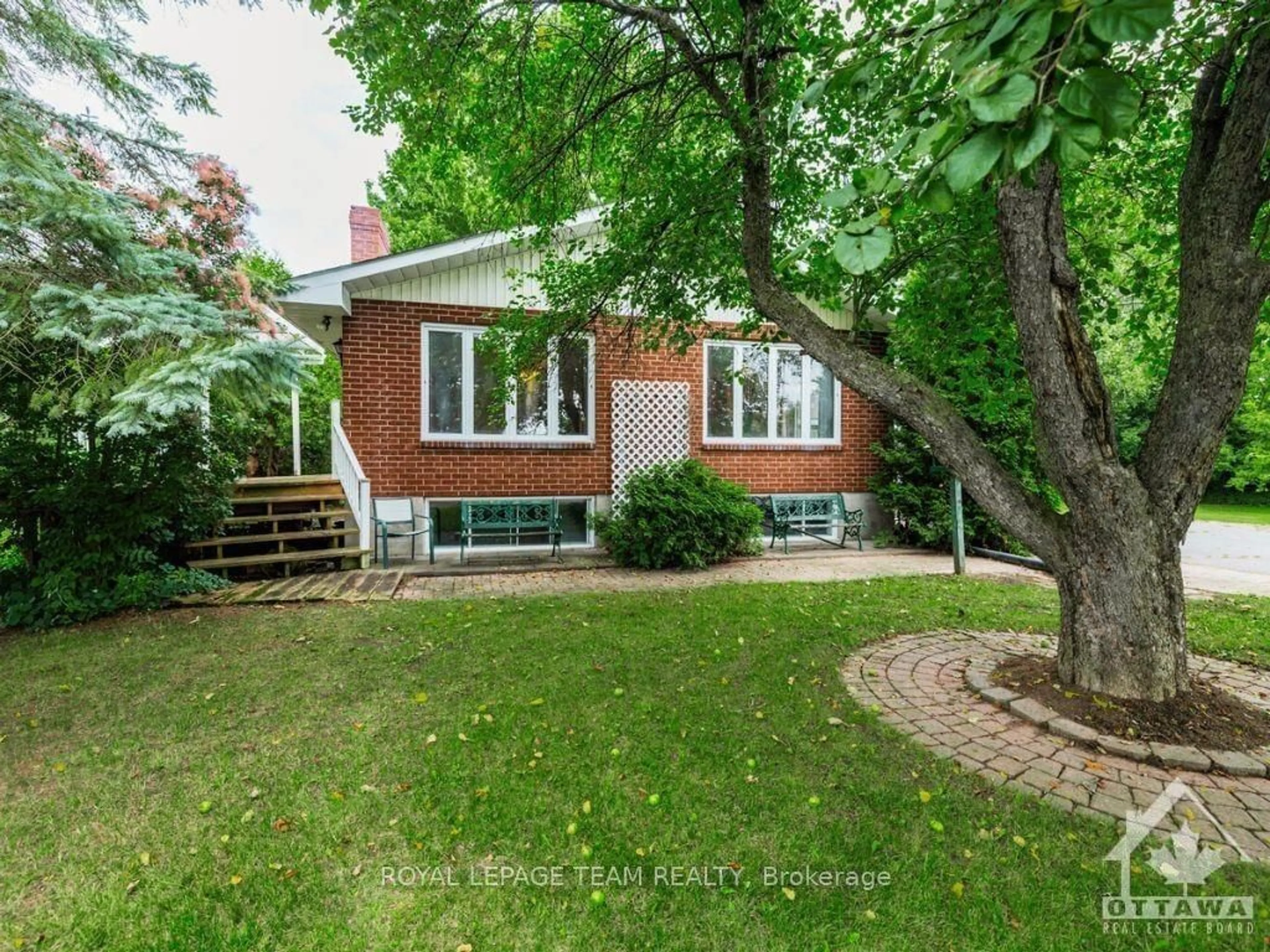 Frontside or backside of a home, the fenced backyard for 10984 COUNTY ROAD 2 Rd, South Dundas Ontario K0E 1K0