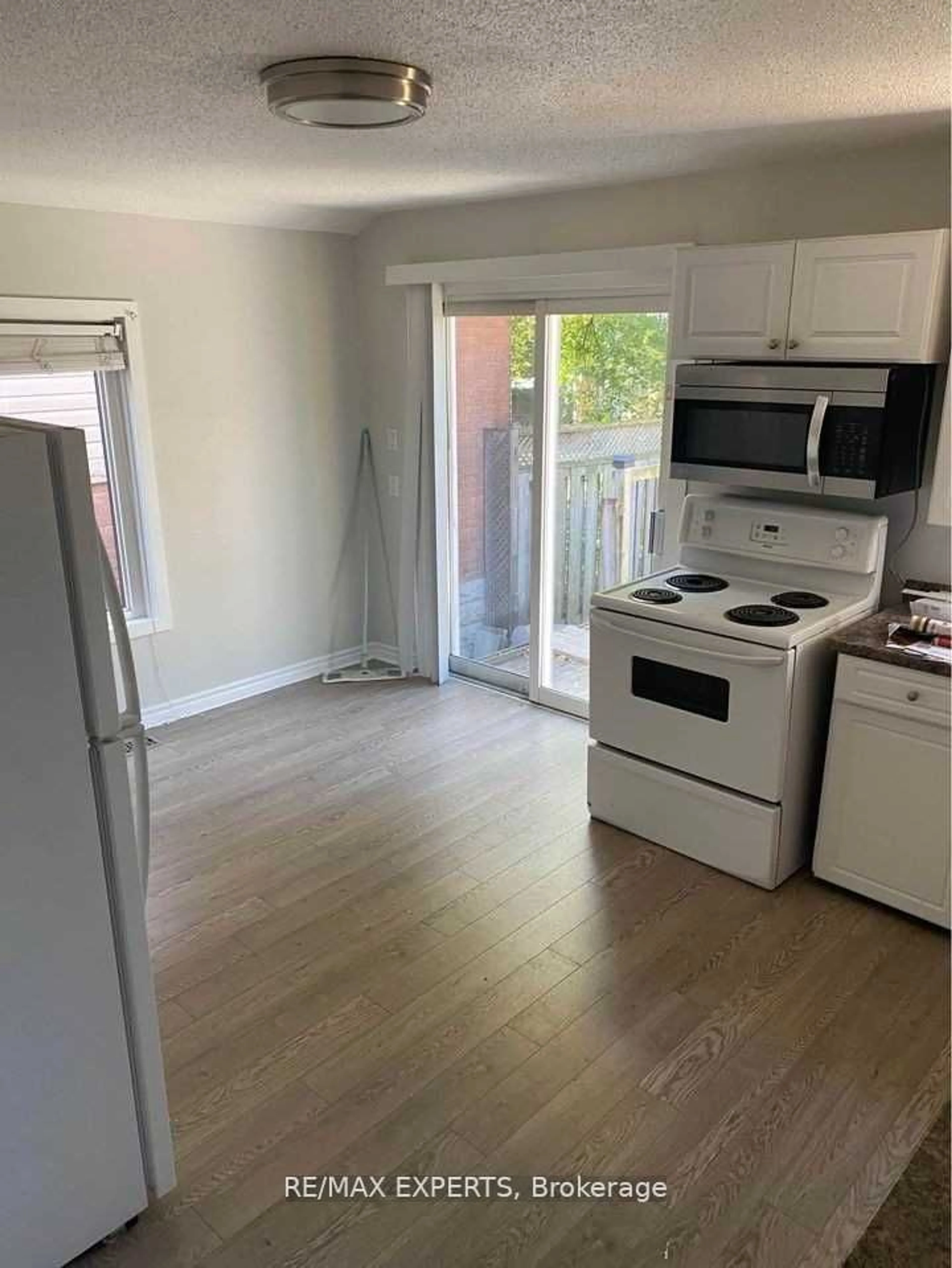 A pic of a room, wood floors for 57 Henry St, St. Catharines Ontario L2R 5T7