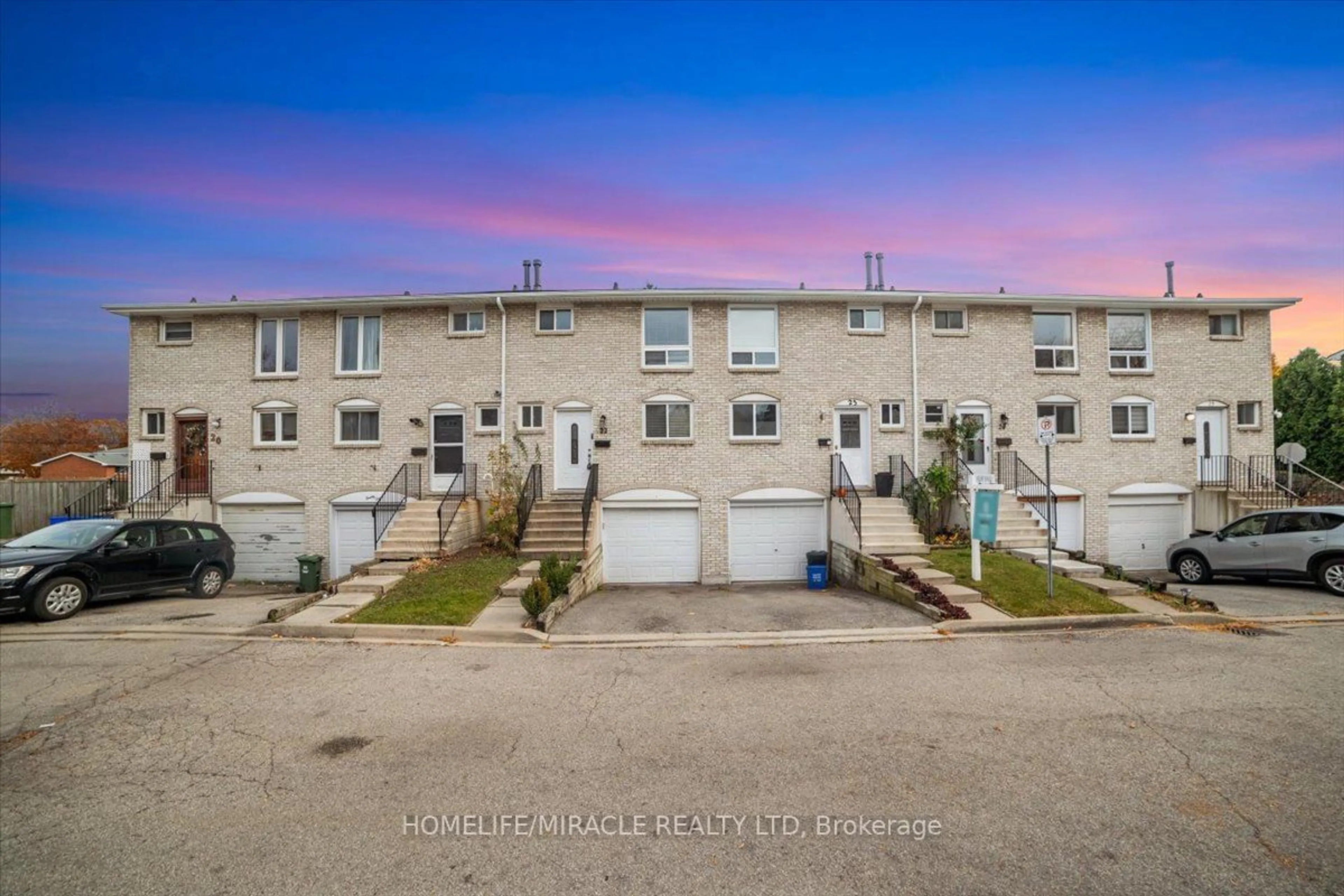 A pic from exterior of the house or condo, the street view for 120 Quigley Rd #22, Hamilton Ontario L8K 6L4