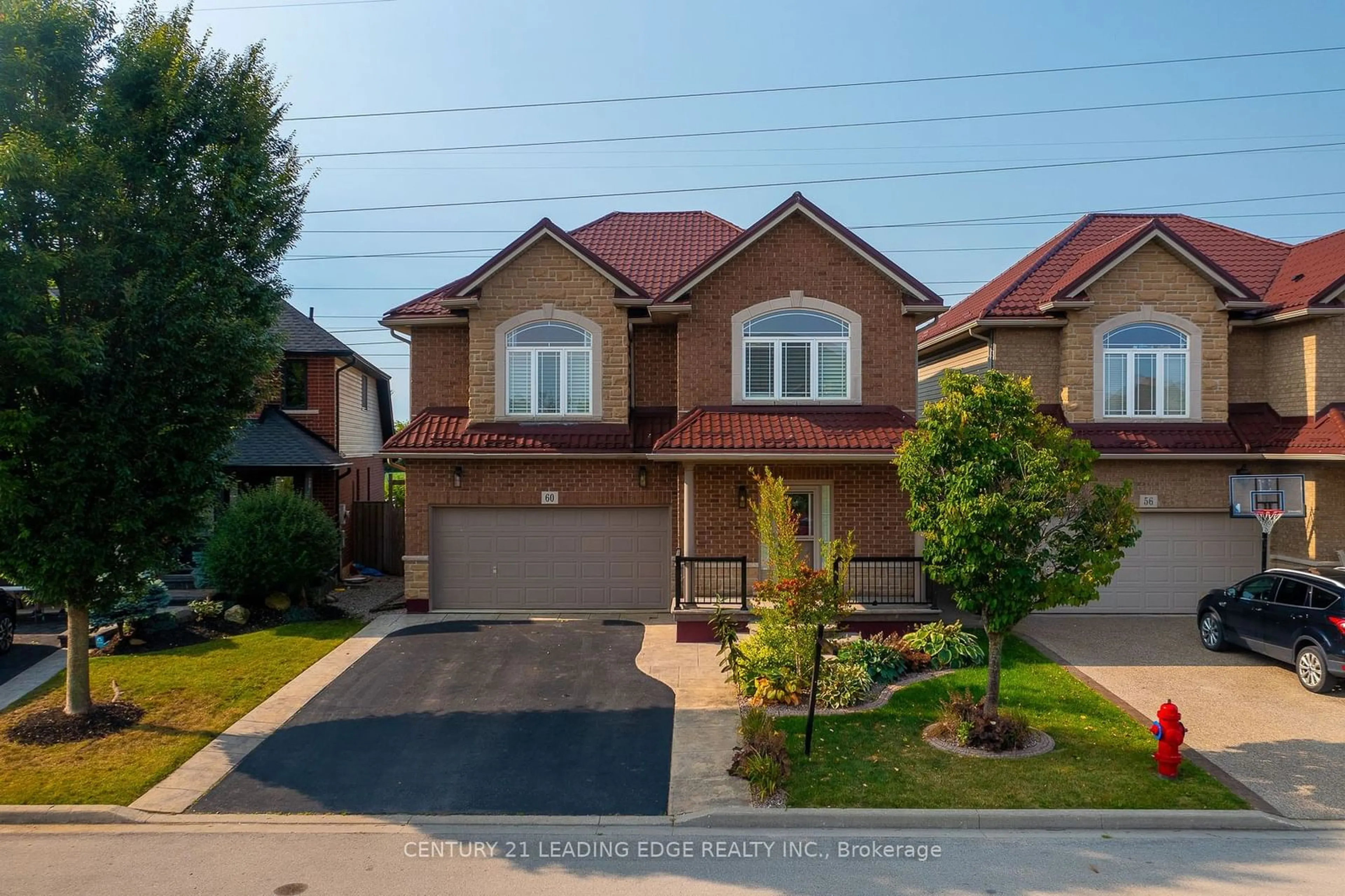 Frontside or backside of a home, the street view for 60 Sundance Cres, Hamilton Ontario L0R 1P0