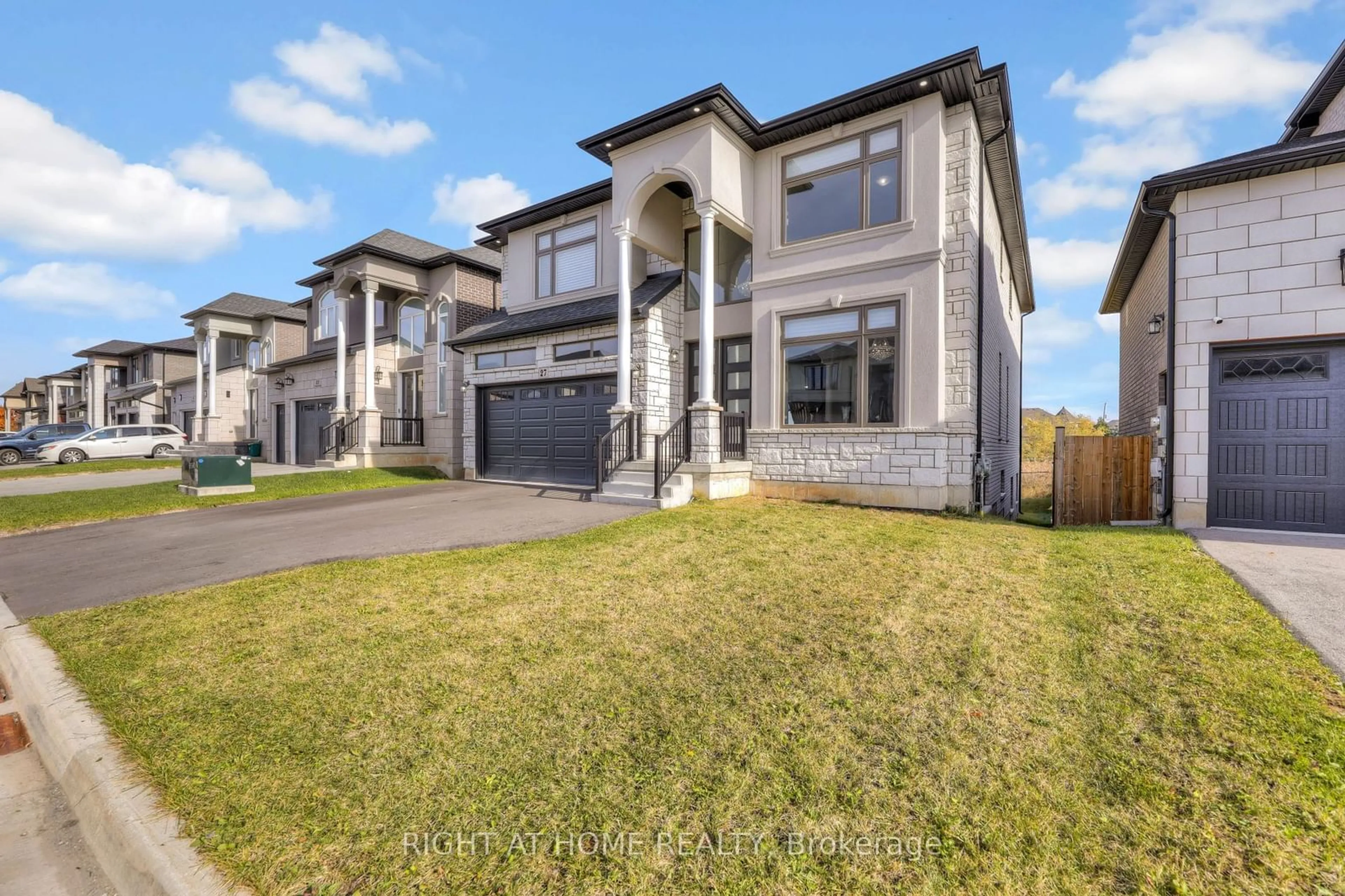 Frontside or backside of a home, the street view for 27 Deerfield Lane, Hamilton Ontario L9K 0K2