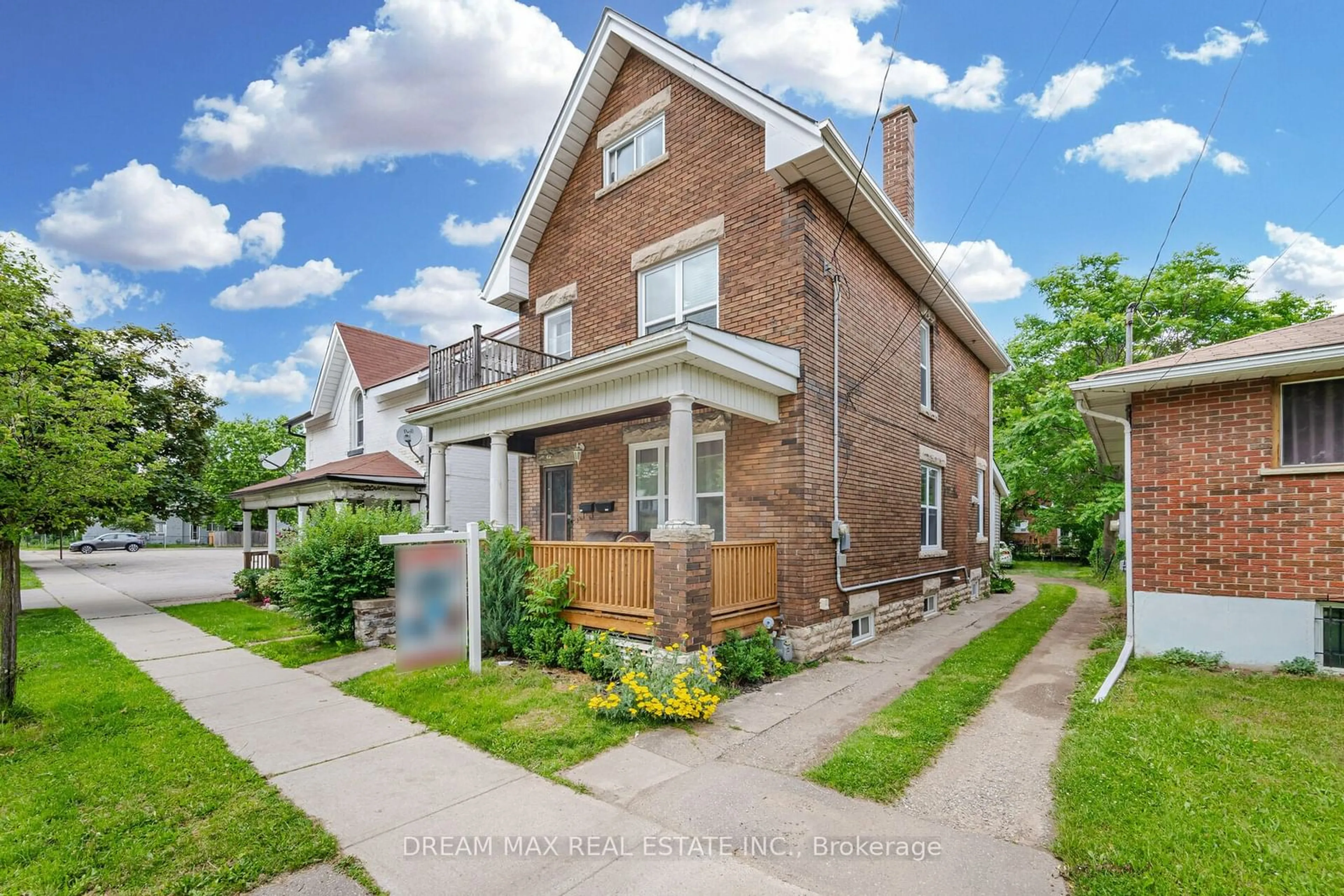 Frontside or backside of a home, the fenced backyard for 117 William St, Brantford Ontario N3T 3K9