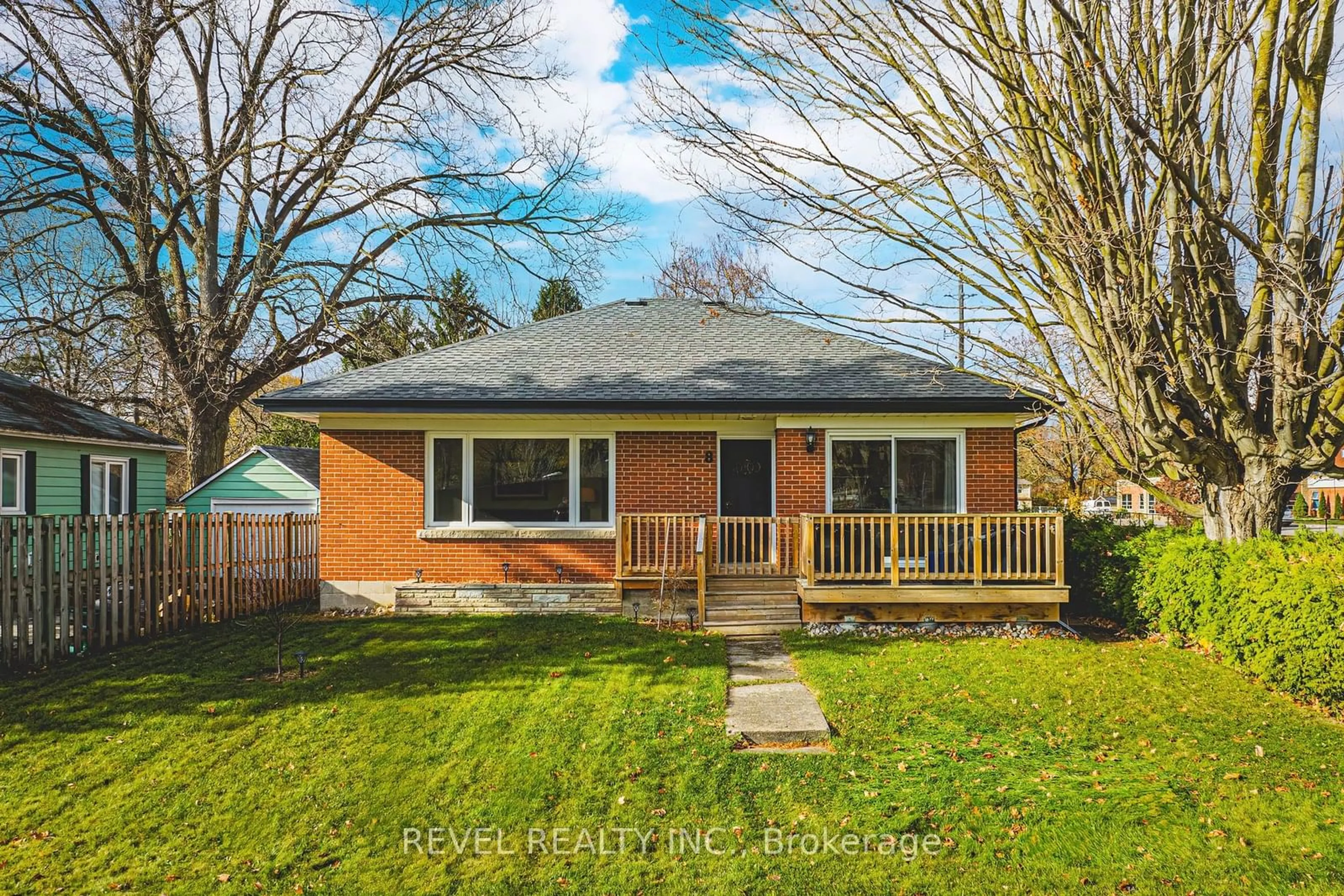 Frontside or backside of a home, the fenced backyard for 8 English St, Erin Ontario N0B 1T0