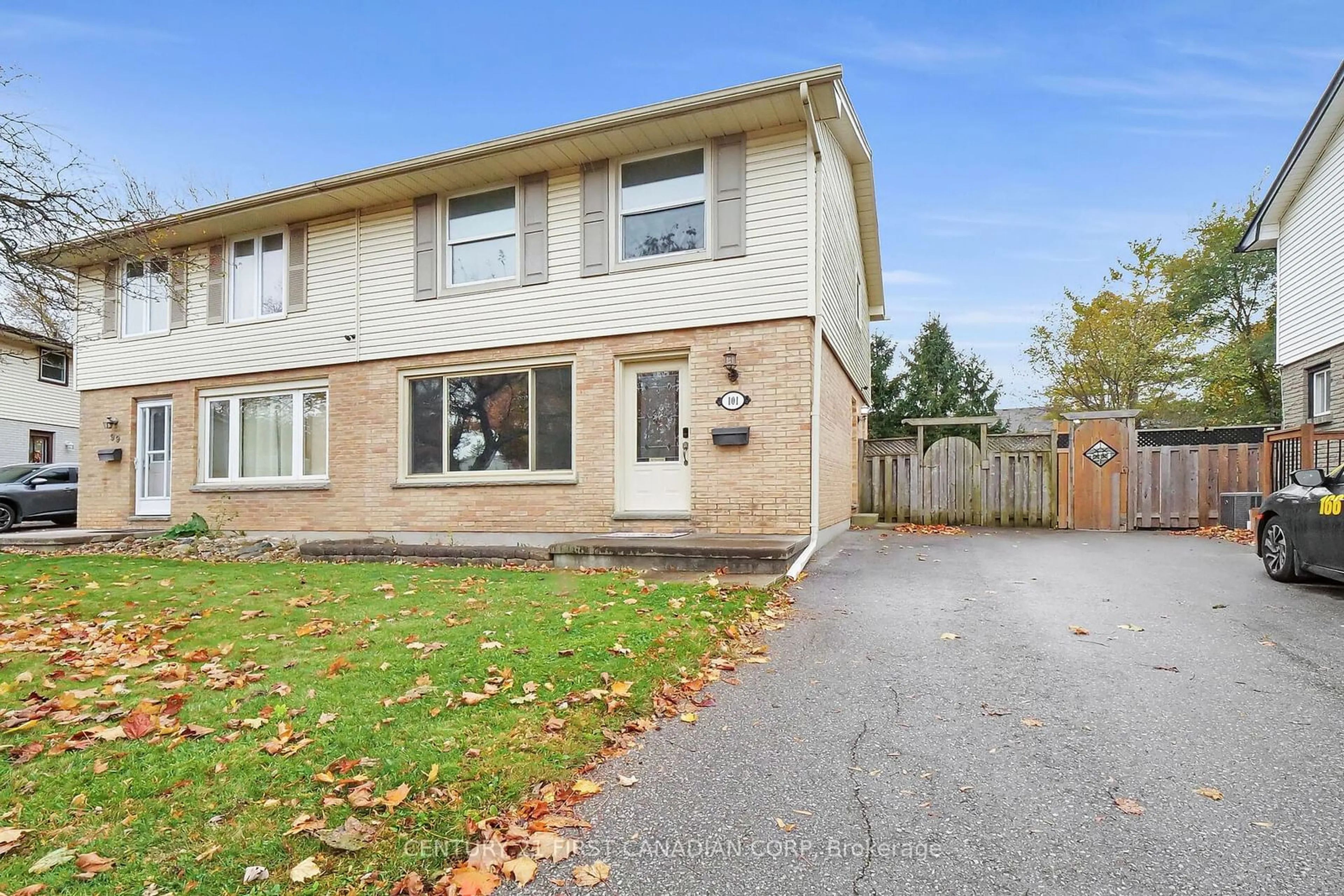 A pic from exterior of the house or condo, the fenced backyard for 101 Woodrow Cres, London Ontario N6E 1E7