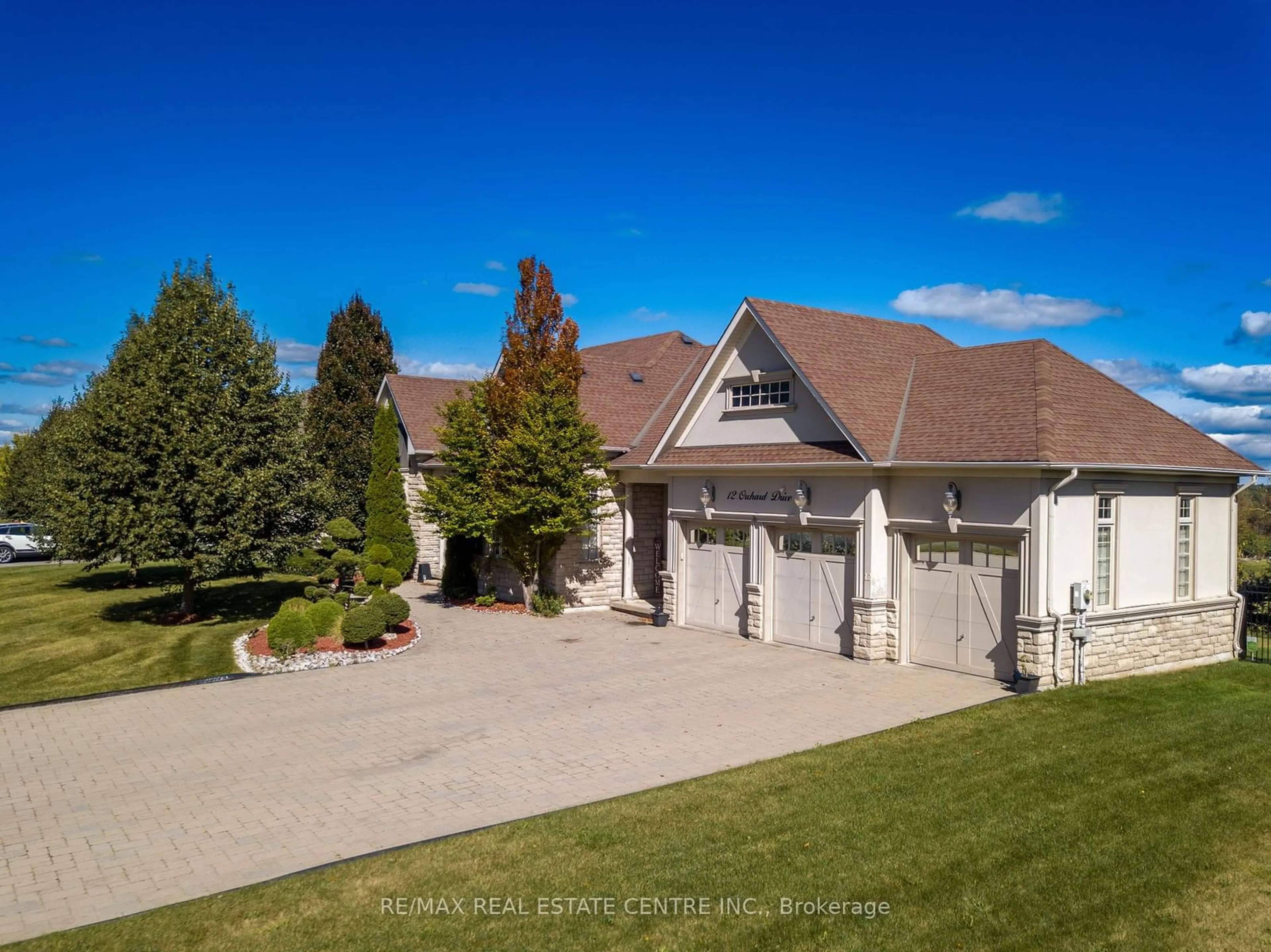 Frontside or backside of a home, the street view for 12 Orchard Dr, Mono Ontario L9W 6L7