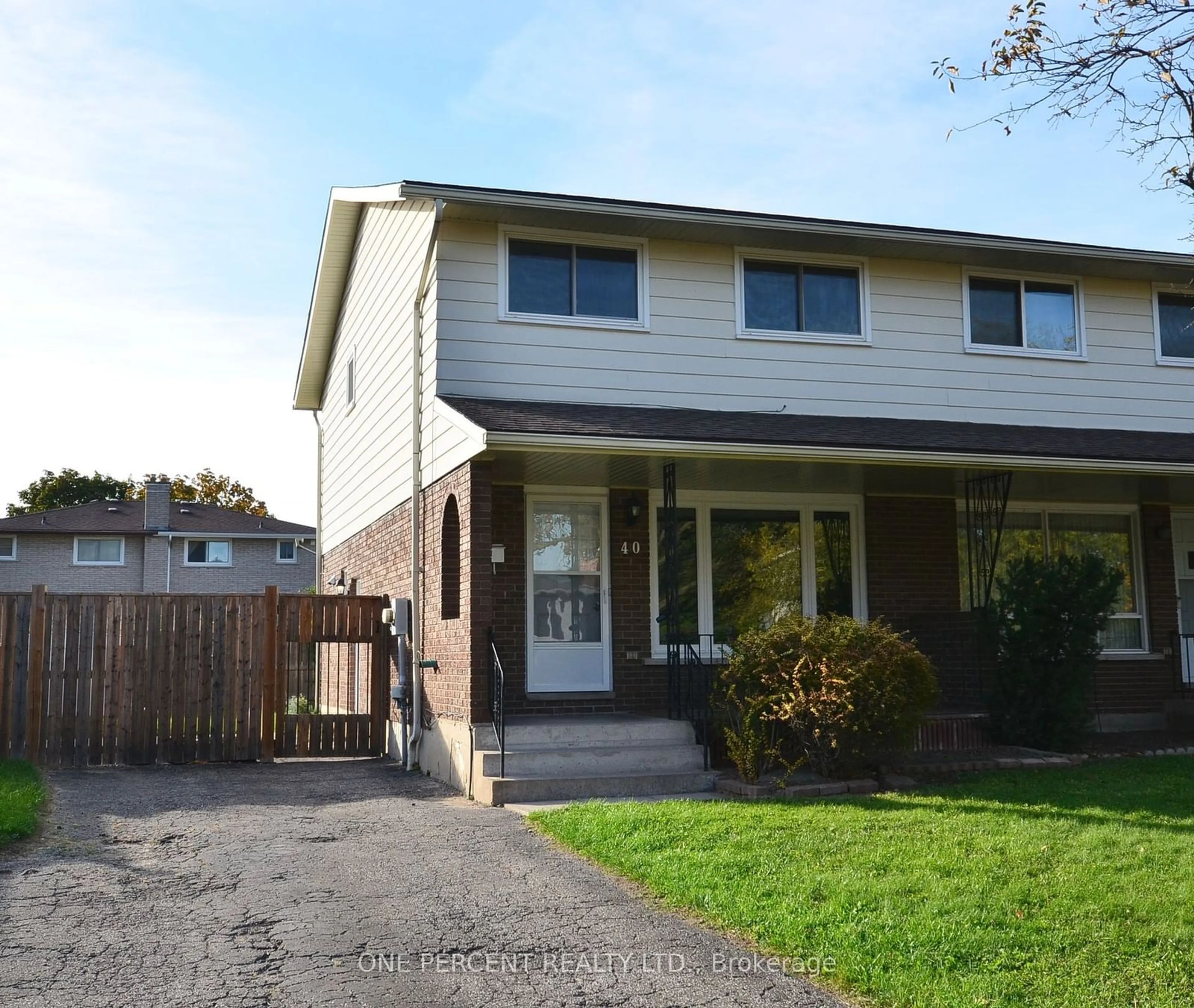 A pic from exterior of the house or condo, the fenced backyard for 40 Westfield Dr, St. Catharines Ontario L2N 5Z6