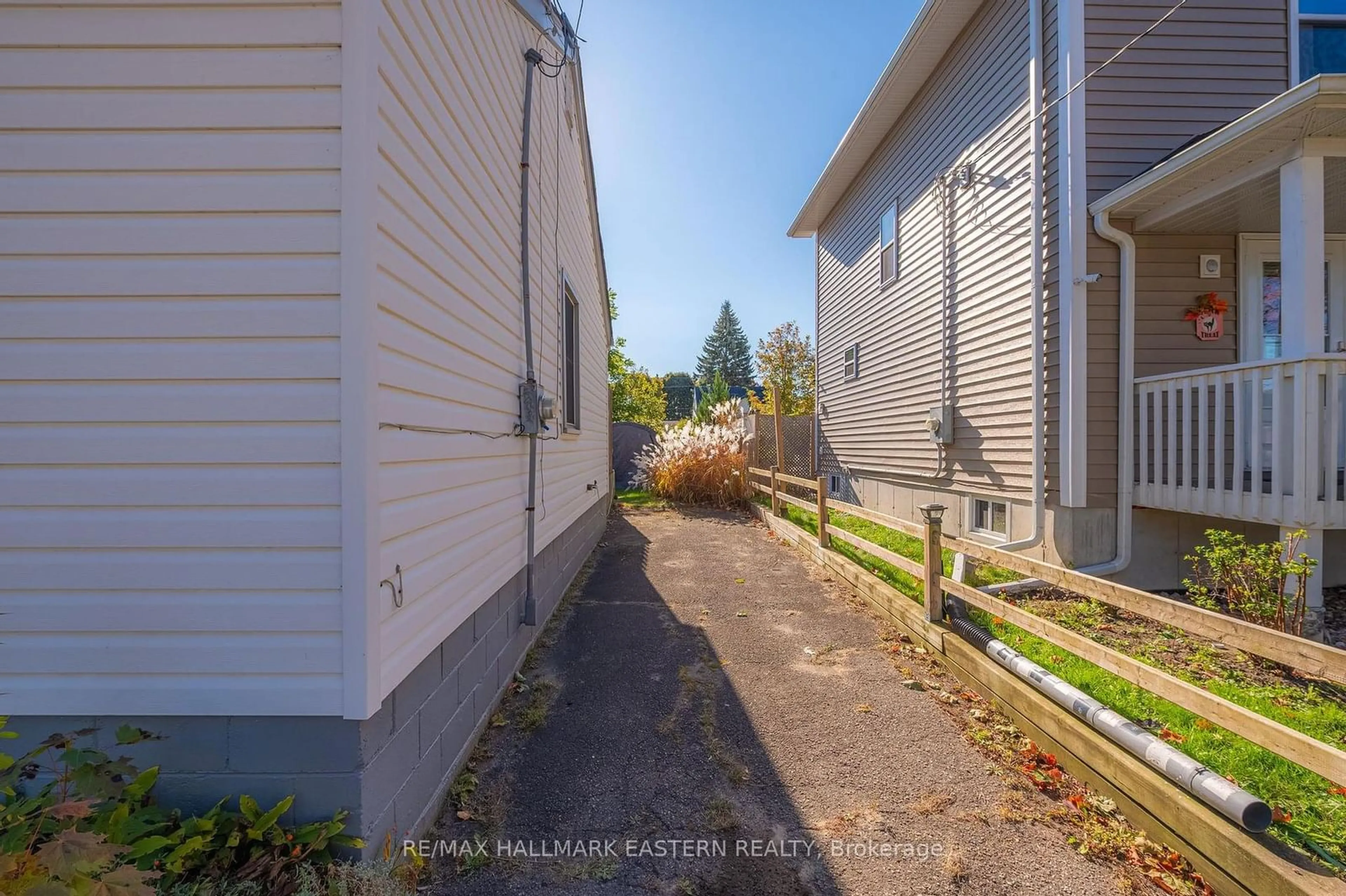 Frontside or backside of a home, the fenced backyard for 451 Harden Cres, Cobourg Ontario K9A 1Z8