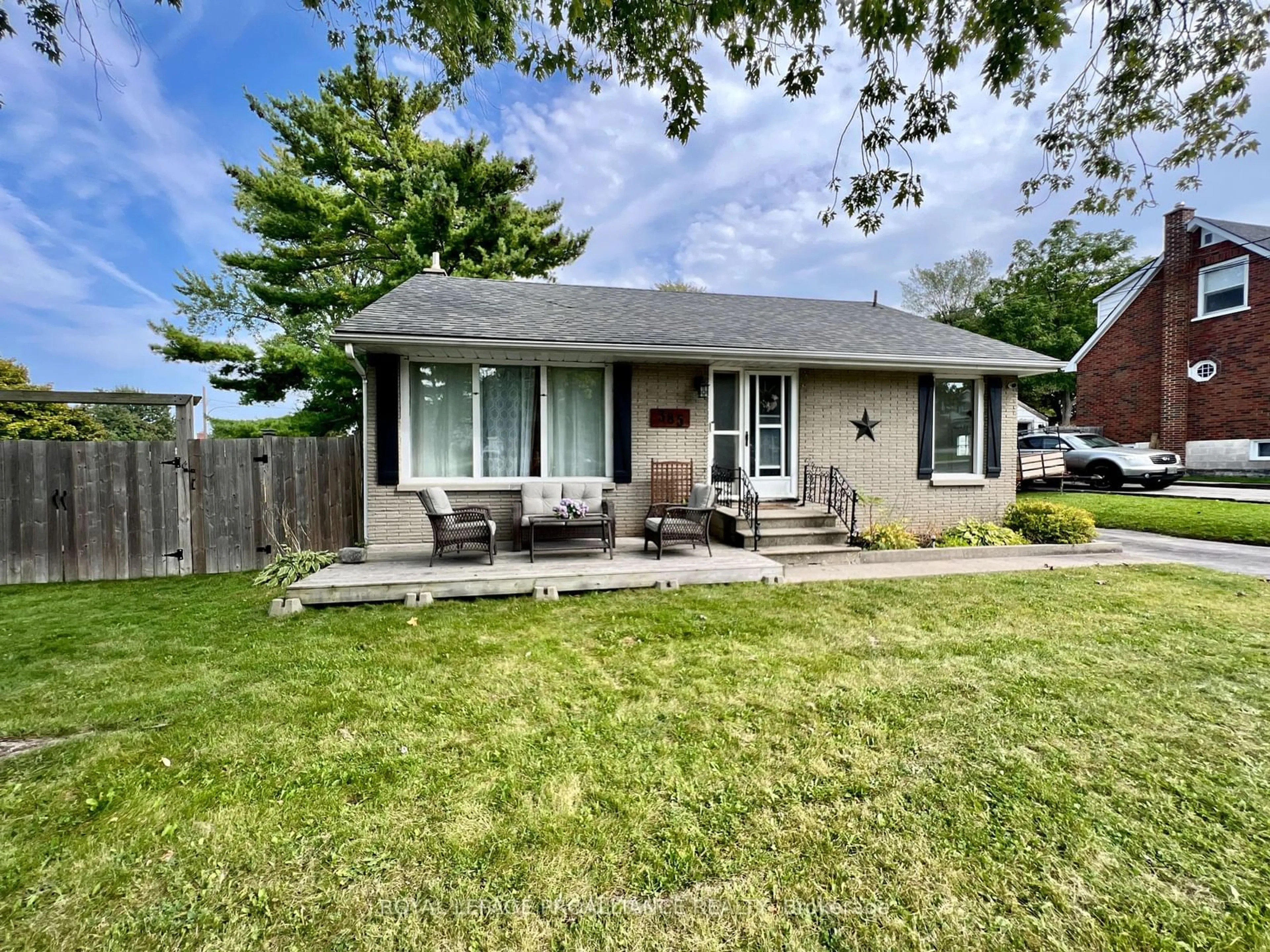 Frontside or backside of a home, the fenced backyard for 385 Dufferin Ave, Belleville Ontario K8N 3X9