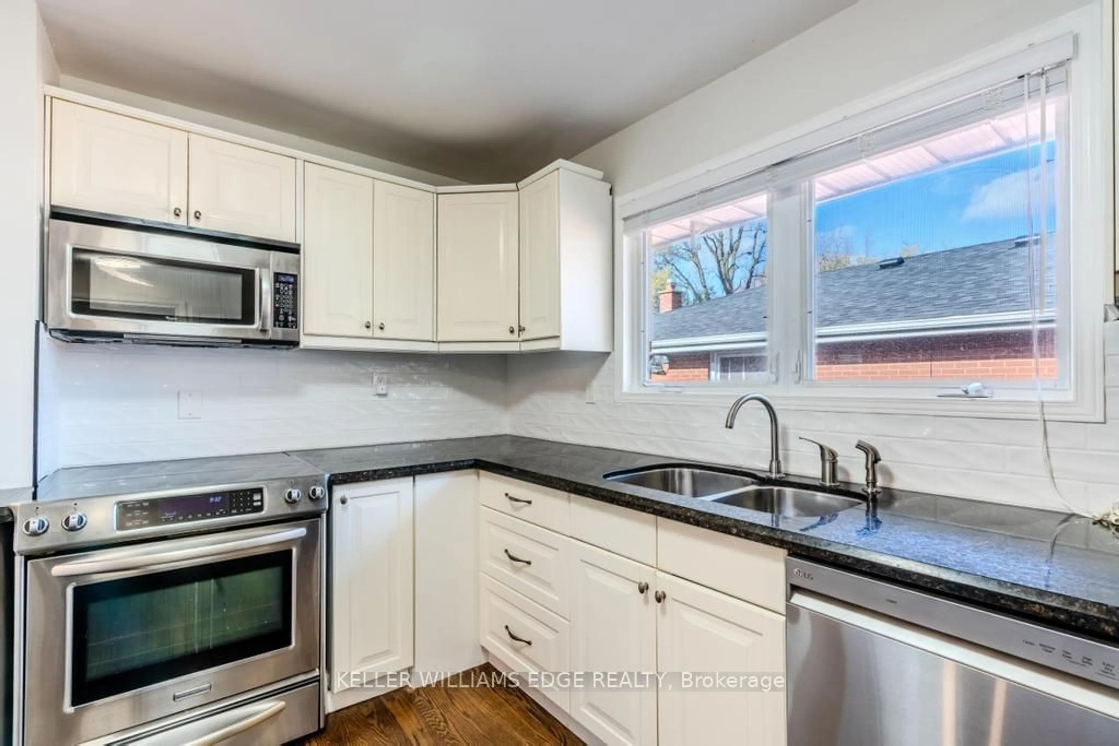 Standard kitchen, wood floors for 242 West 18th St, Hamilton Ontario L9C 4G9