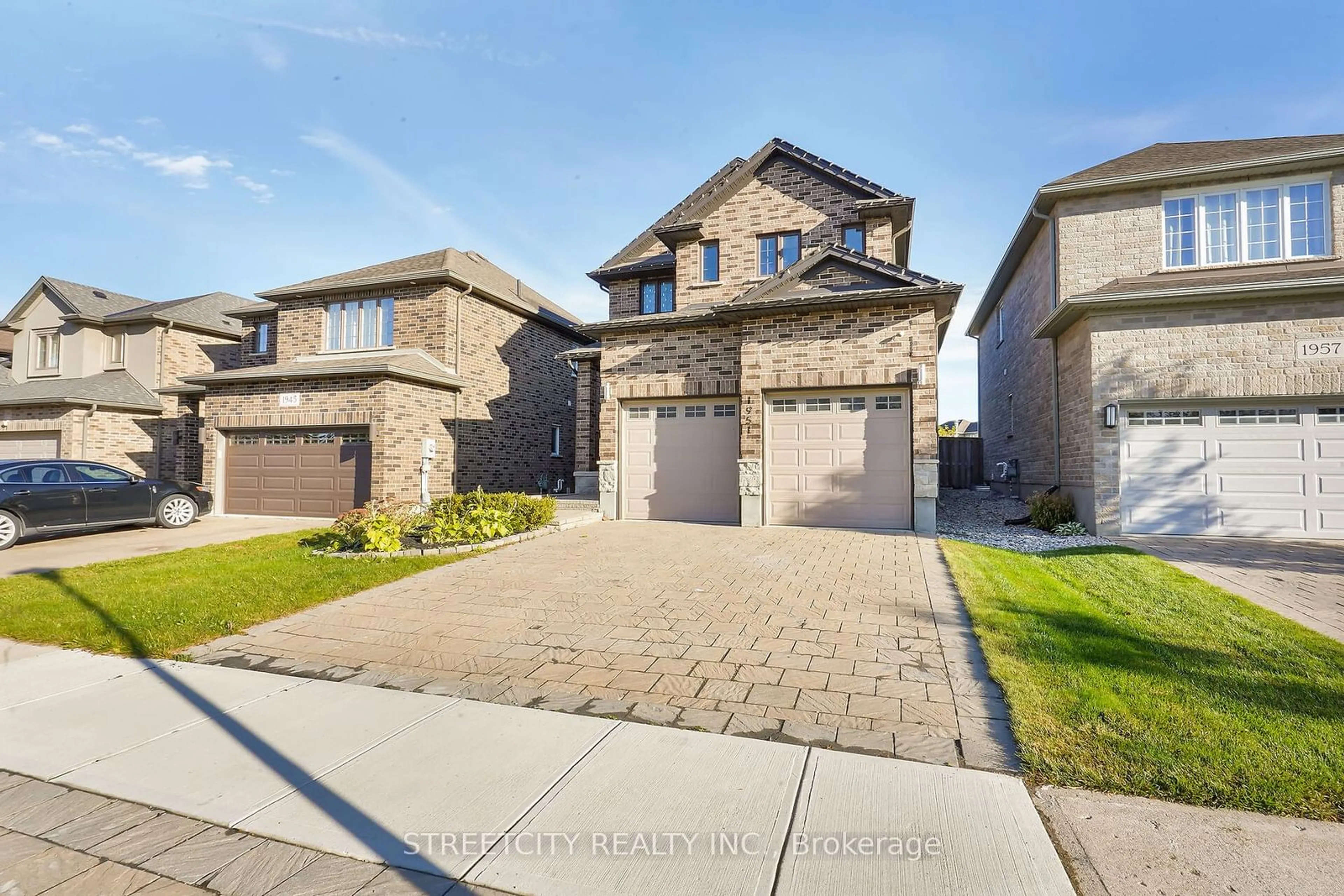 Frontside or backside of a home, the street view for 1951 Cherrywood Tr, London Ontario N6H 0C9