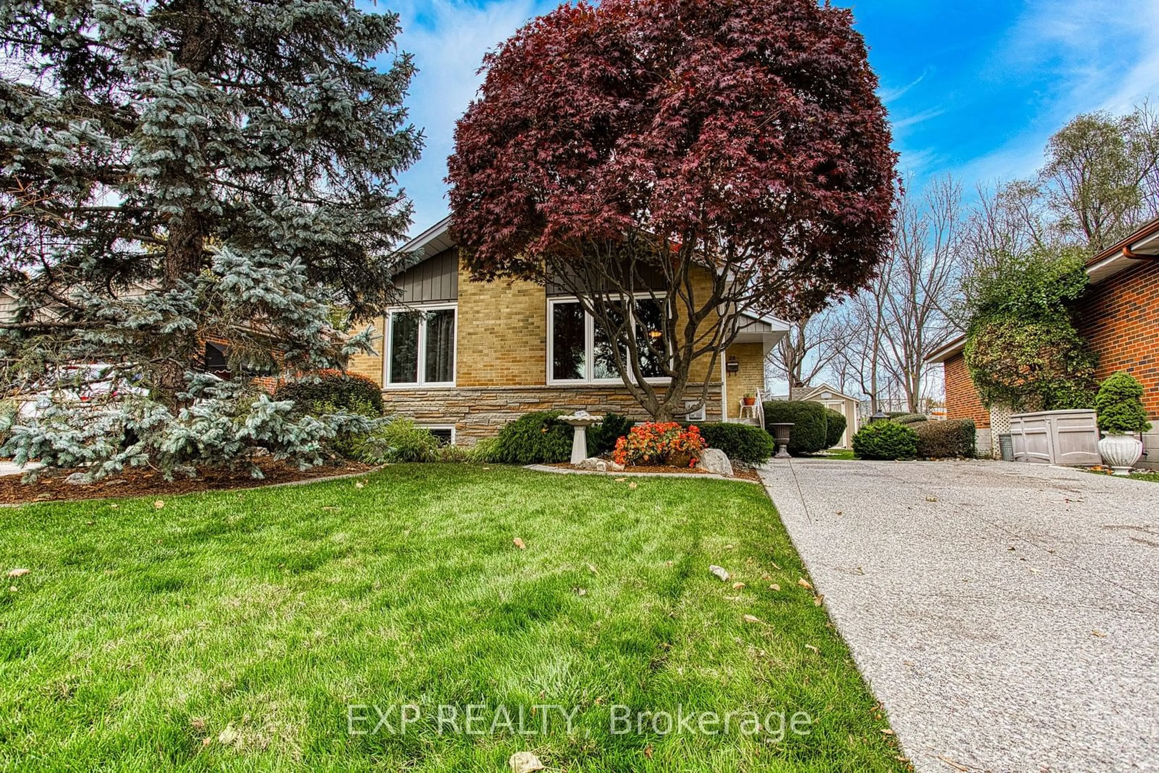 Frontside or backside of a home, the fenced backyard for 28 Ramsey Cres, Hamilton Ontario L8S 2N2