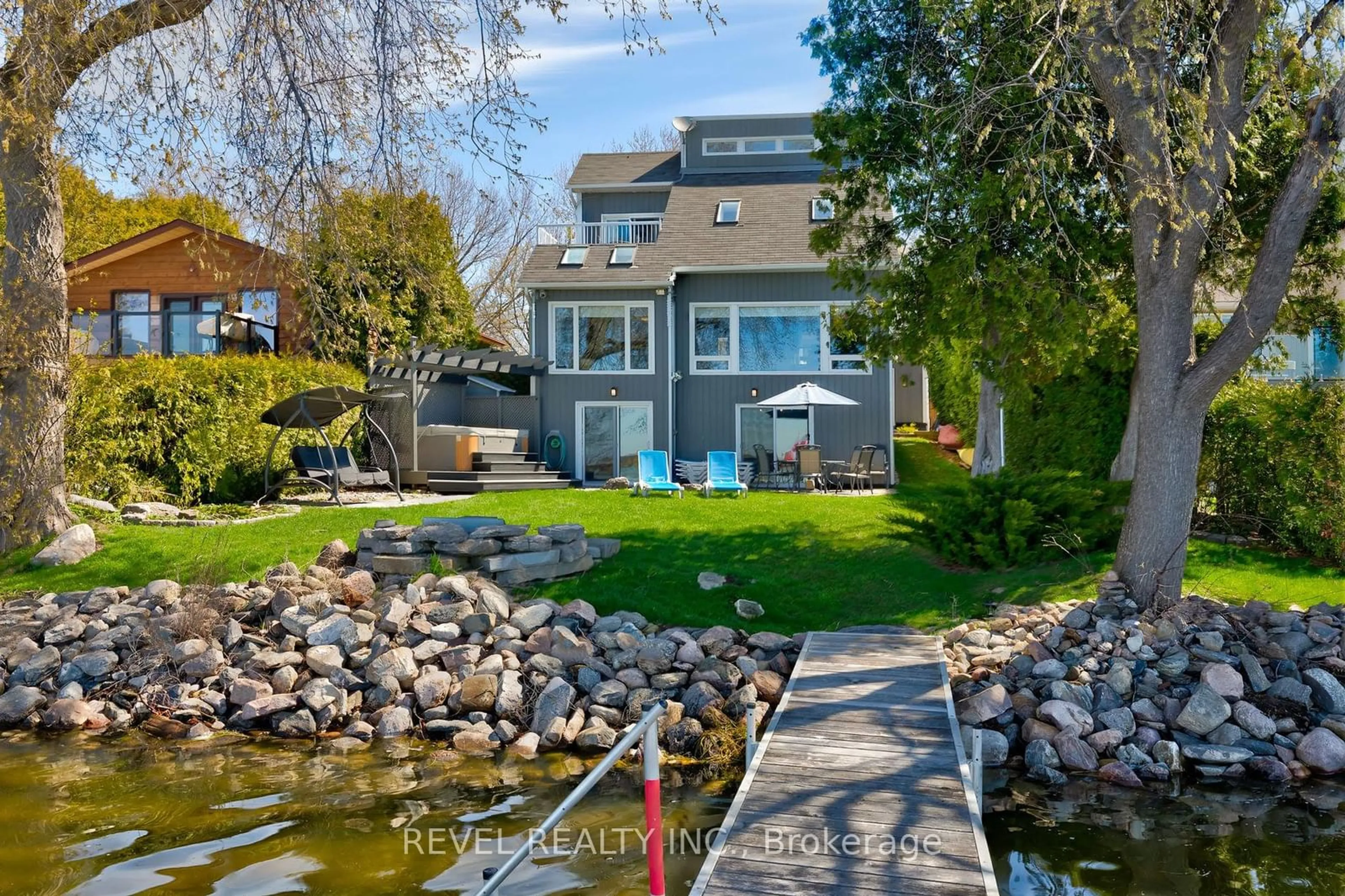 A pic from exterior of the house or condo, the fenced backyard for 28 Wakeford Rd, Kawartha Lakes Ontario K0M 2C0