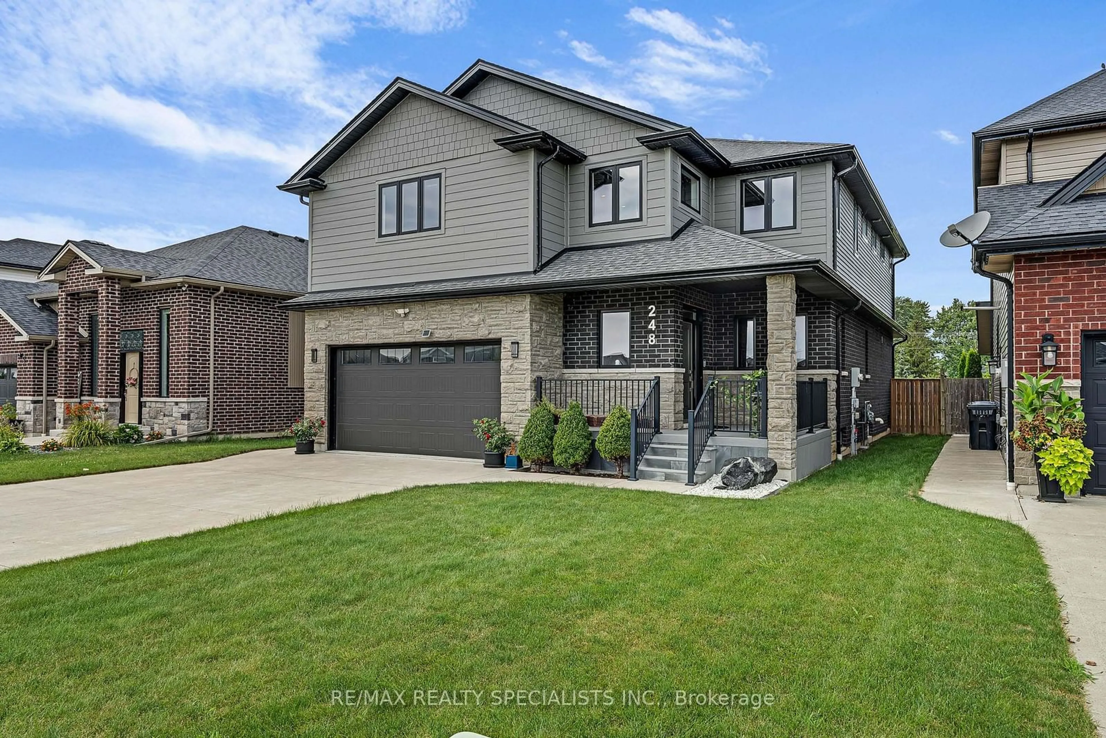 Frontside or backside of a home, the street view for 248 Summer St, Windsor Ontario N0R 1A0