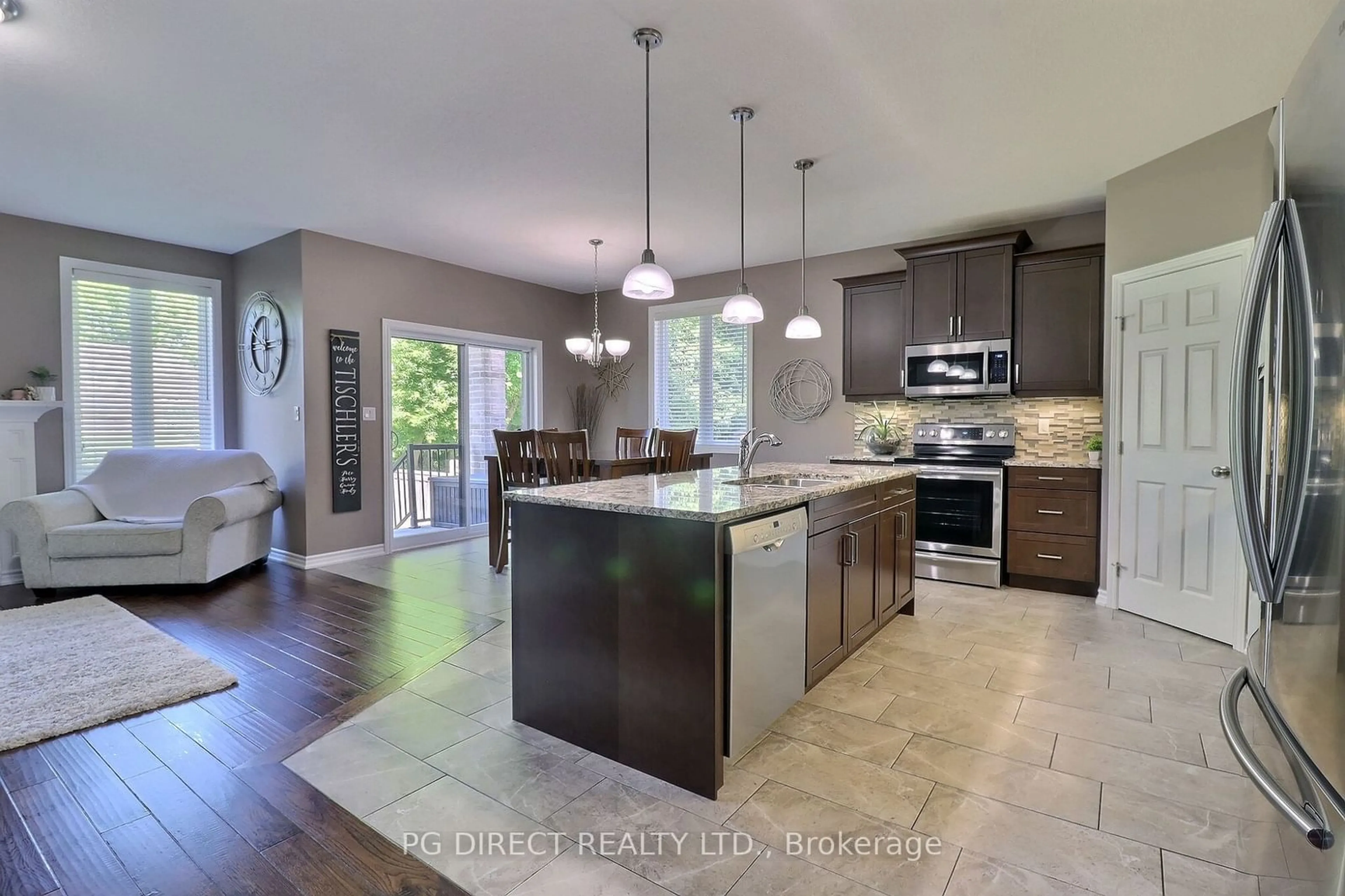 Open concept kitchen for 67 Caverhill Cres, Middlesex Centre Ontario N0L 1R0