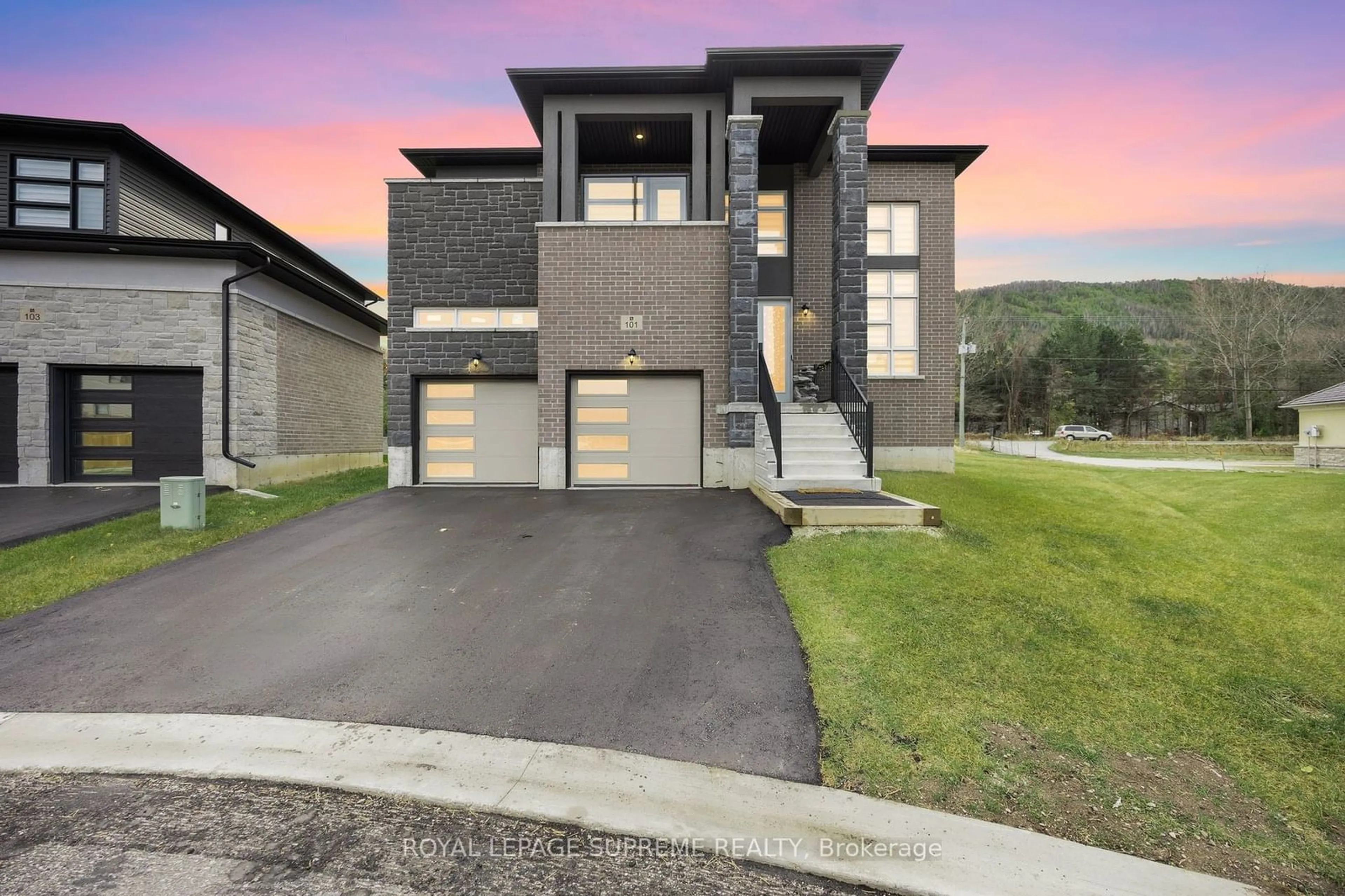 Frontside or backside of a home, the street view for 101 Sebastian St, Blue Mountains Ontario N0H 1J0