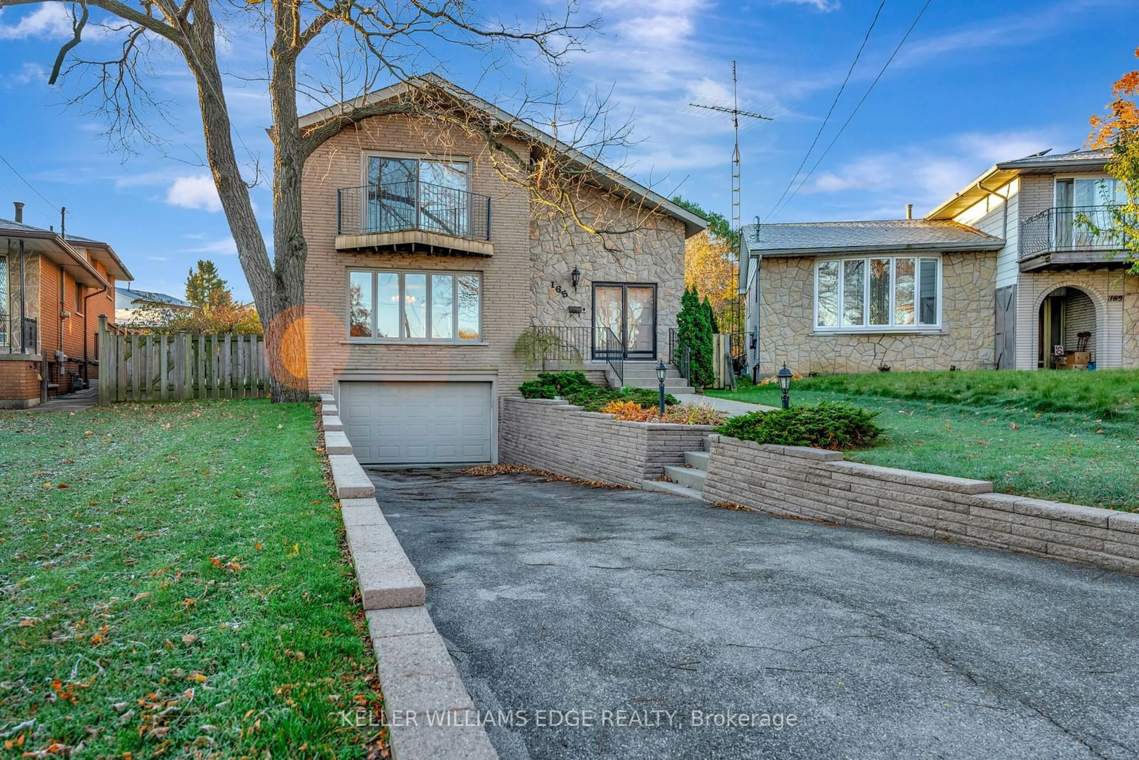 Frontside or backside of a home, the street view for 165 Burrwood Dr, Hamilton Ontario L9C 3T3