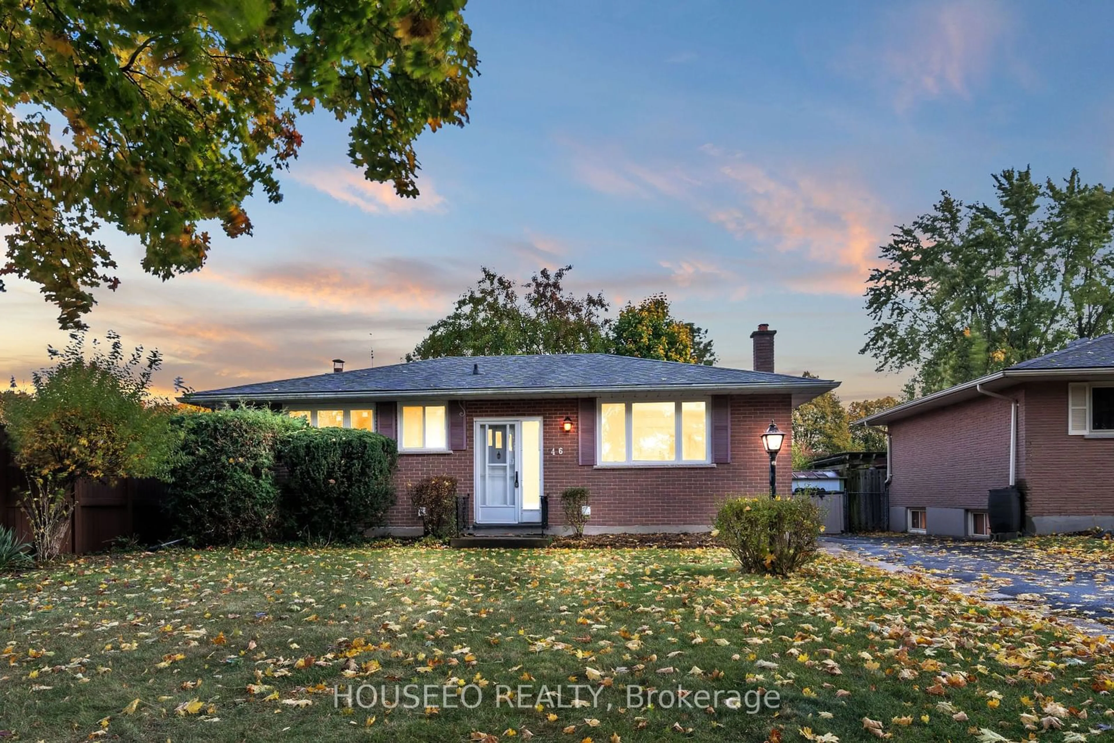 Frontside or backside of a home, the fenced backyard for 46 Aponi Cres, London Ontario N5V 2V4