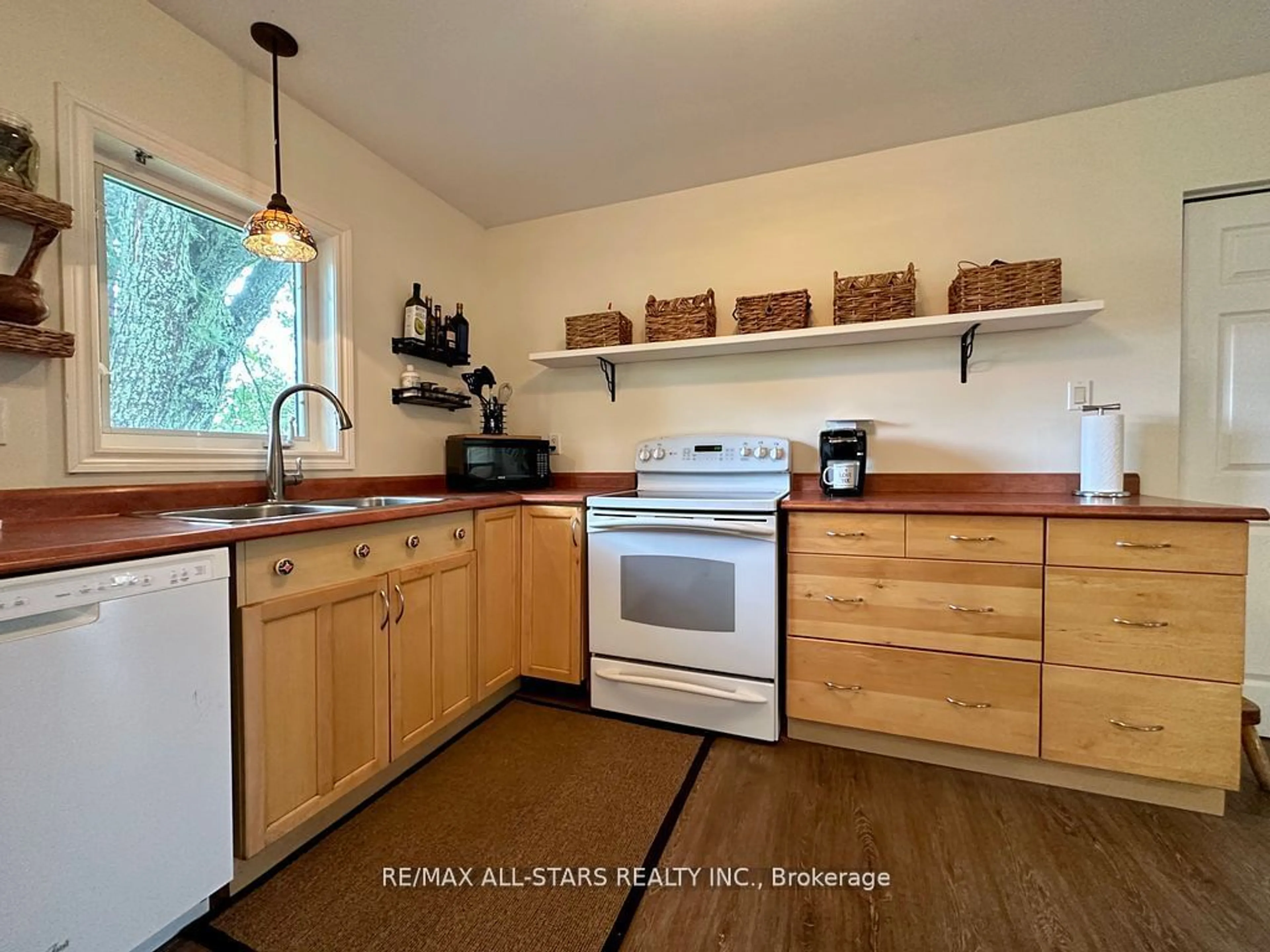 Standard kitchen, wood floors, cottage for 721 Hiawatha Line, Otonabee-South Monaghan Ontario K0L 2G0