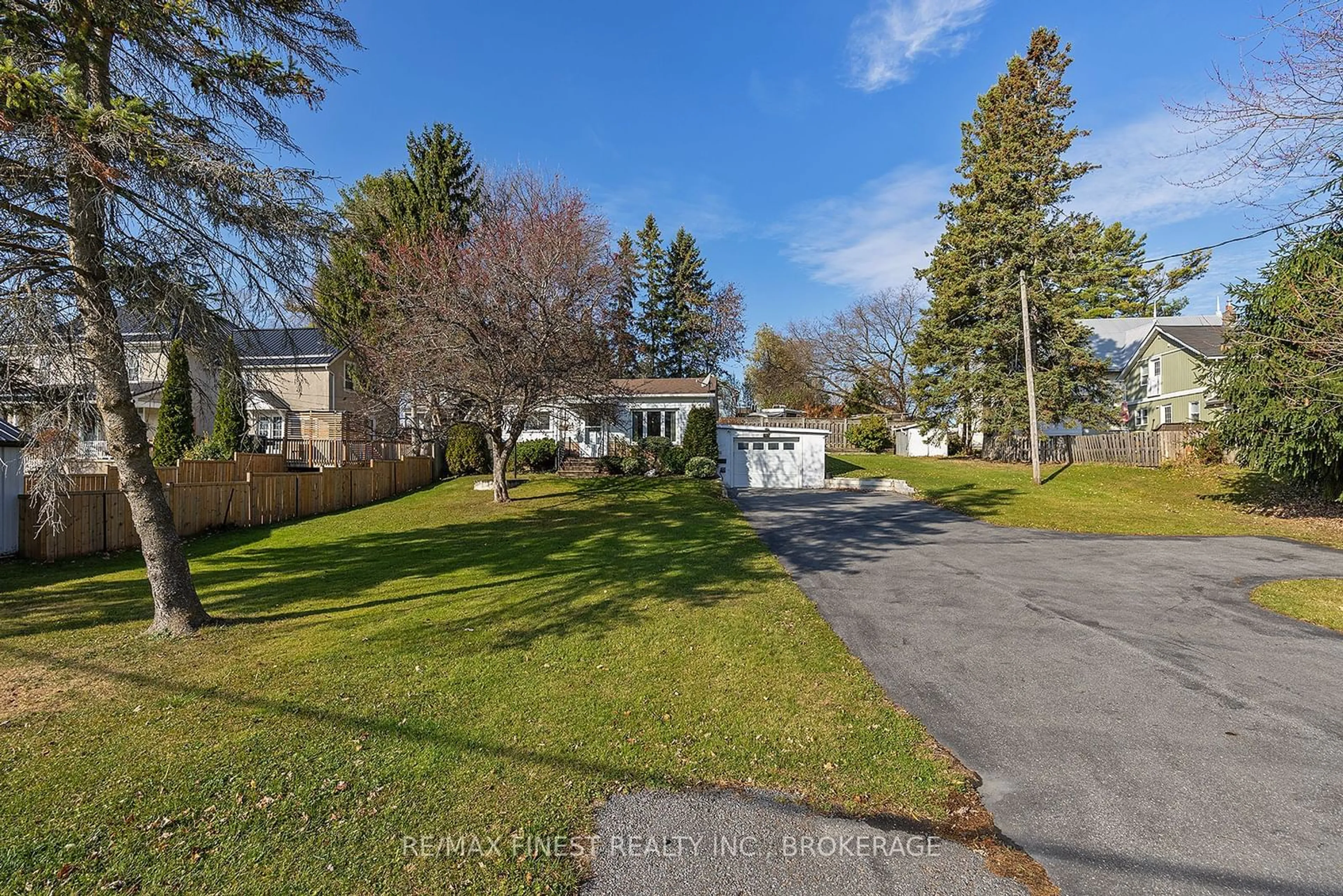 A pic from exterior of the house or condo, the fenced backyard for 380 Queen St, Loyalist Ontario K0H 1G0