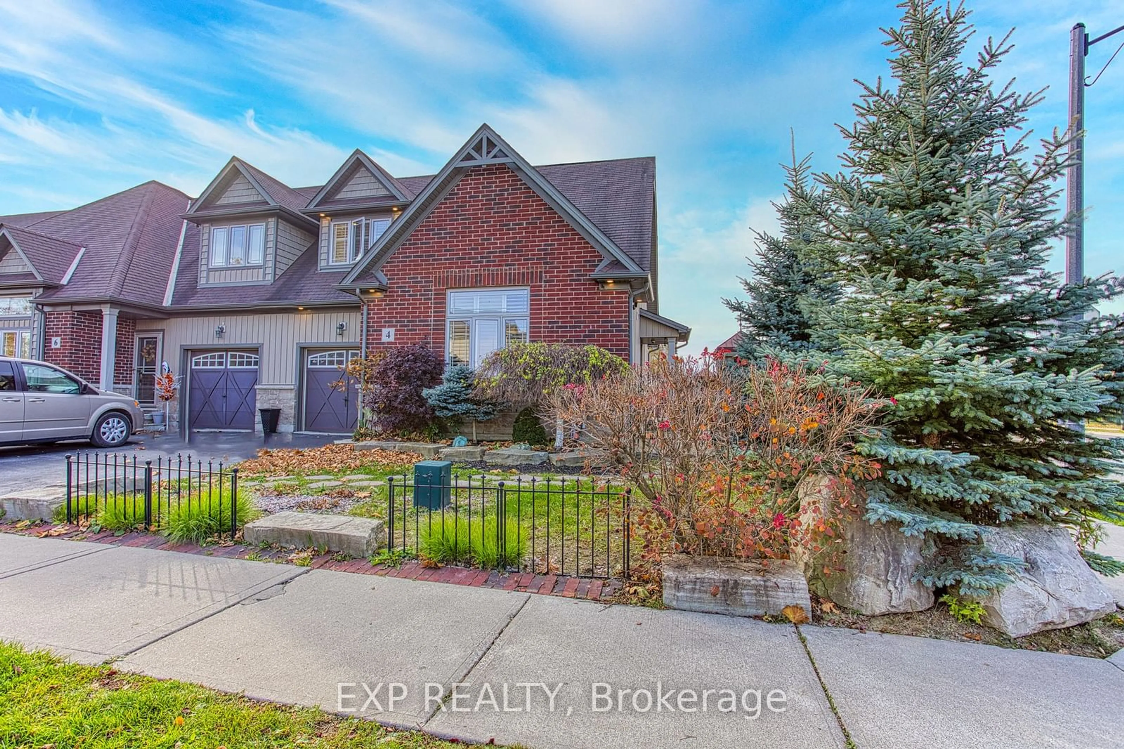 Frontside or backside of a home, the fenced backyard for 4 Valiant Circ, Hamilton Ontario L0R 1C0