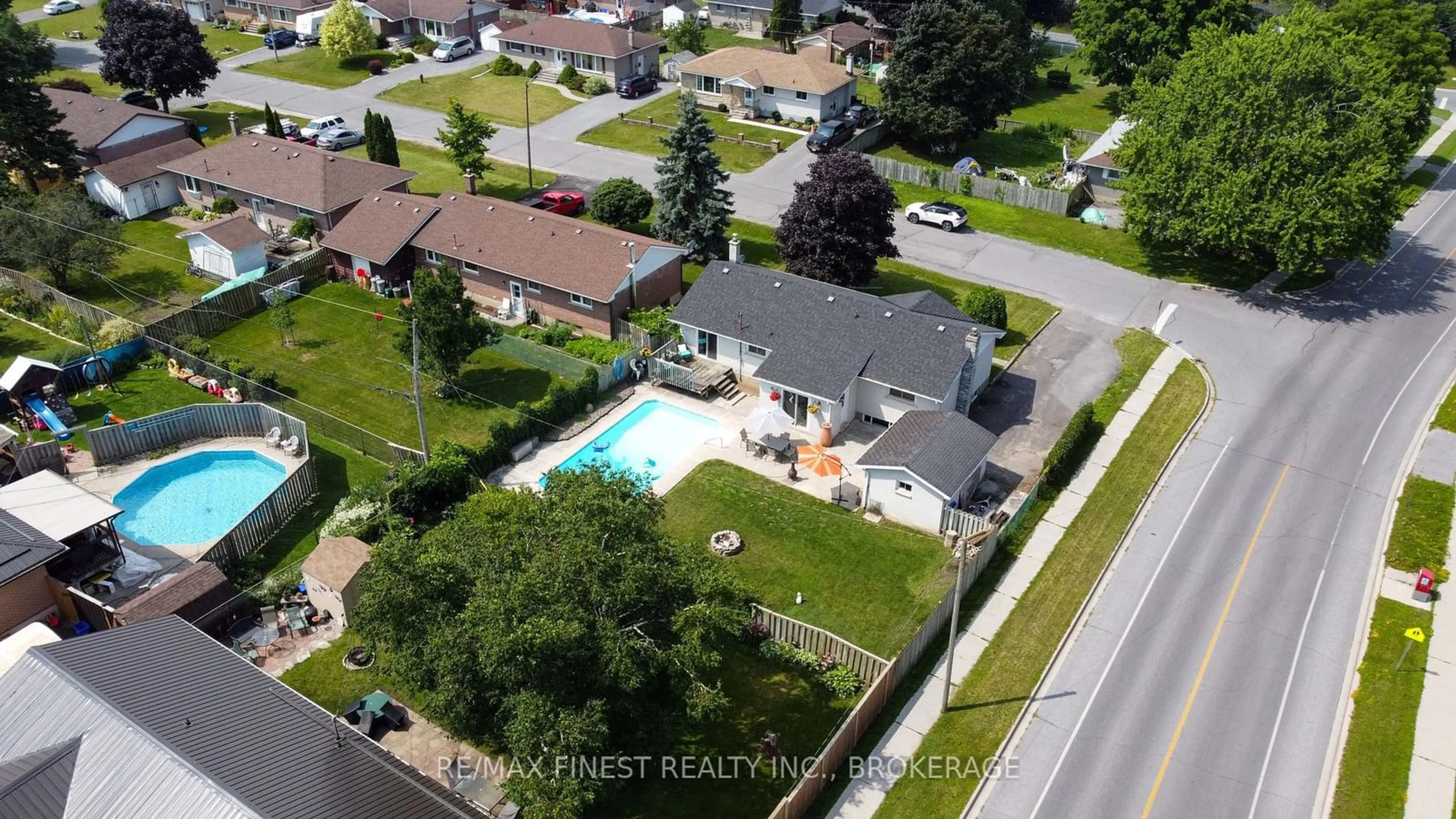 Frontside or backside of a home, the fenced backyard for 87 Oxford Cres, Loyalist Ontario K7N 1R1