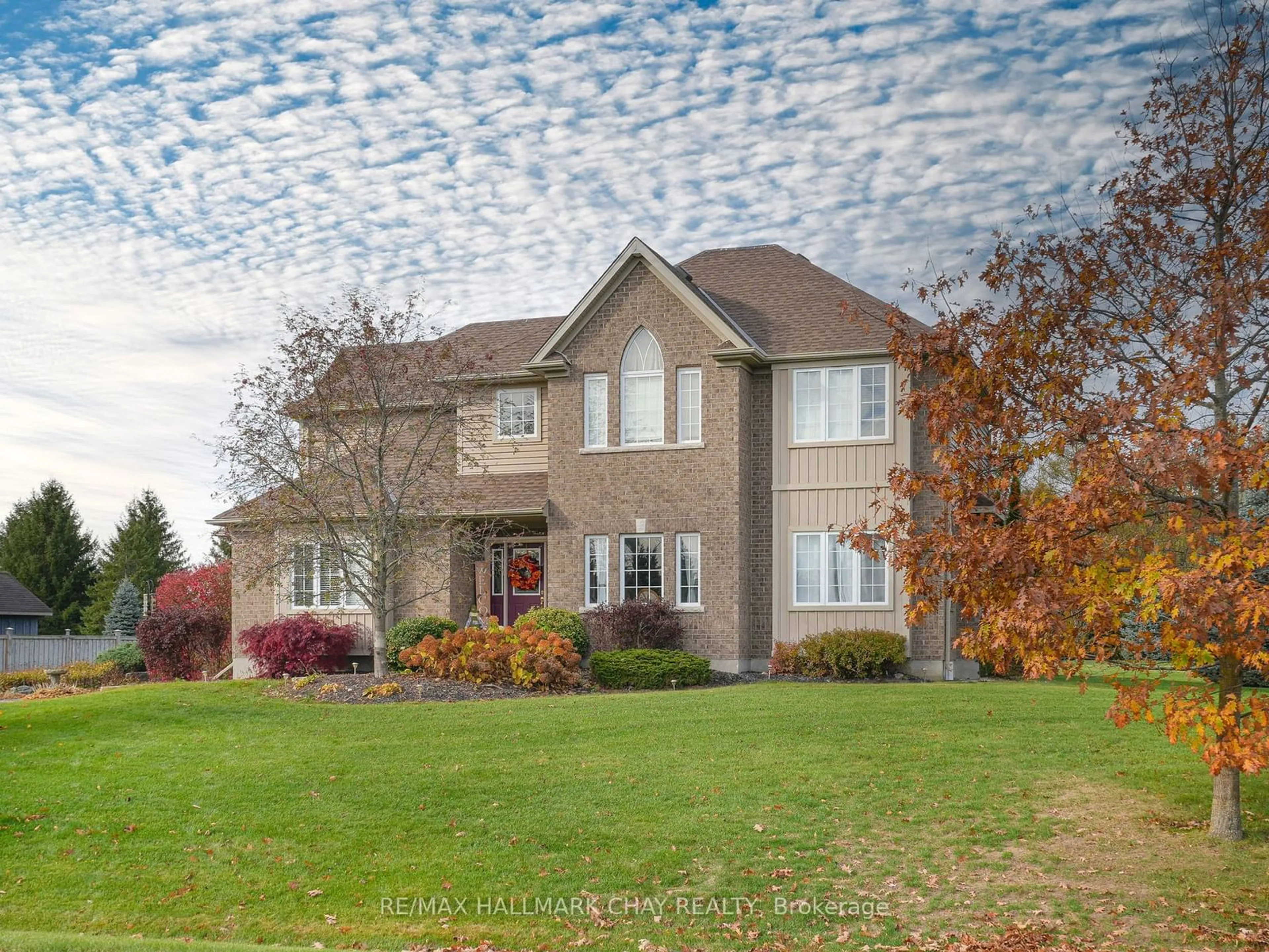 Frontside or backside of a home, the street view for 18 Thomson Tr, Mulmur Ontario L9V 3J1