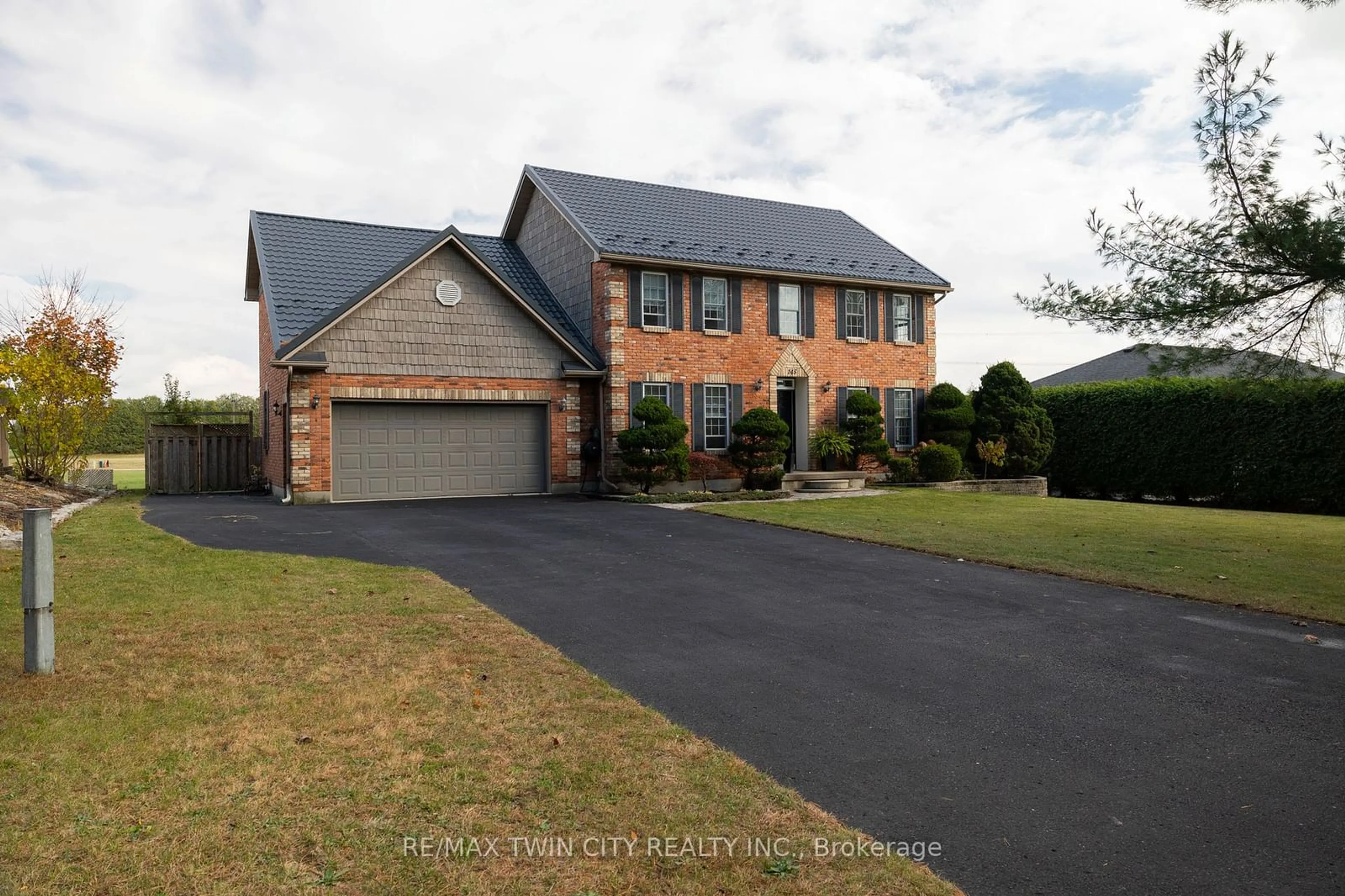 Frontside or backside of a home, the street view for 145 JOHN St, Norwich Ontario N0J 1R0