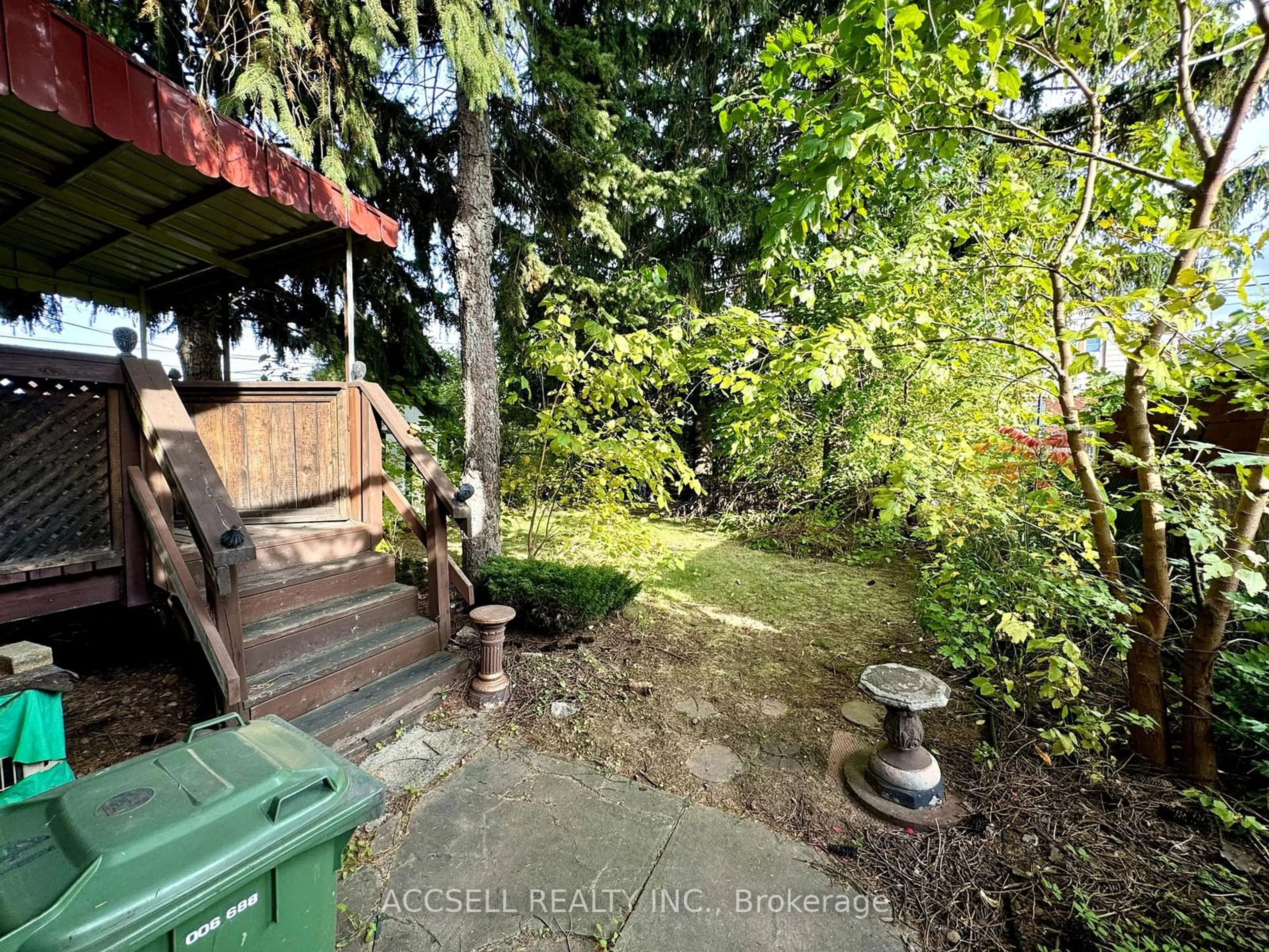 Patio, the fenced backyard for 41 Cameron Ave, Hamilton Ontario L8K 2X1