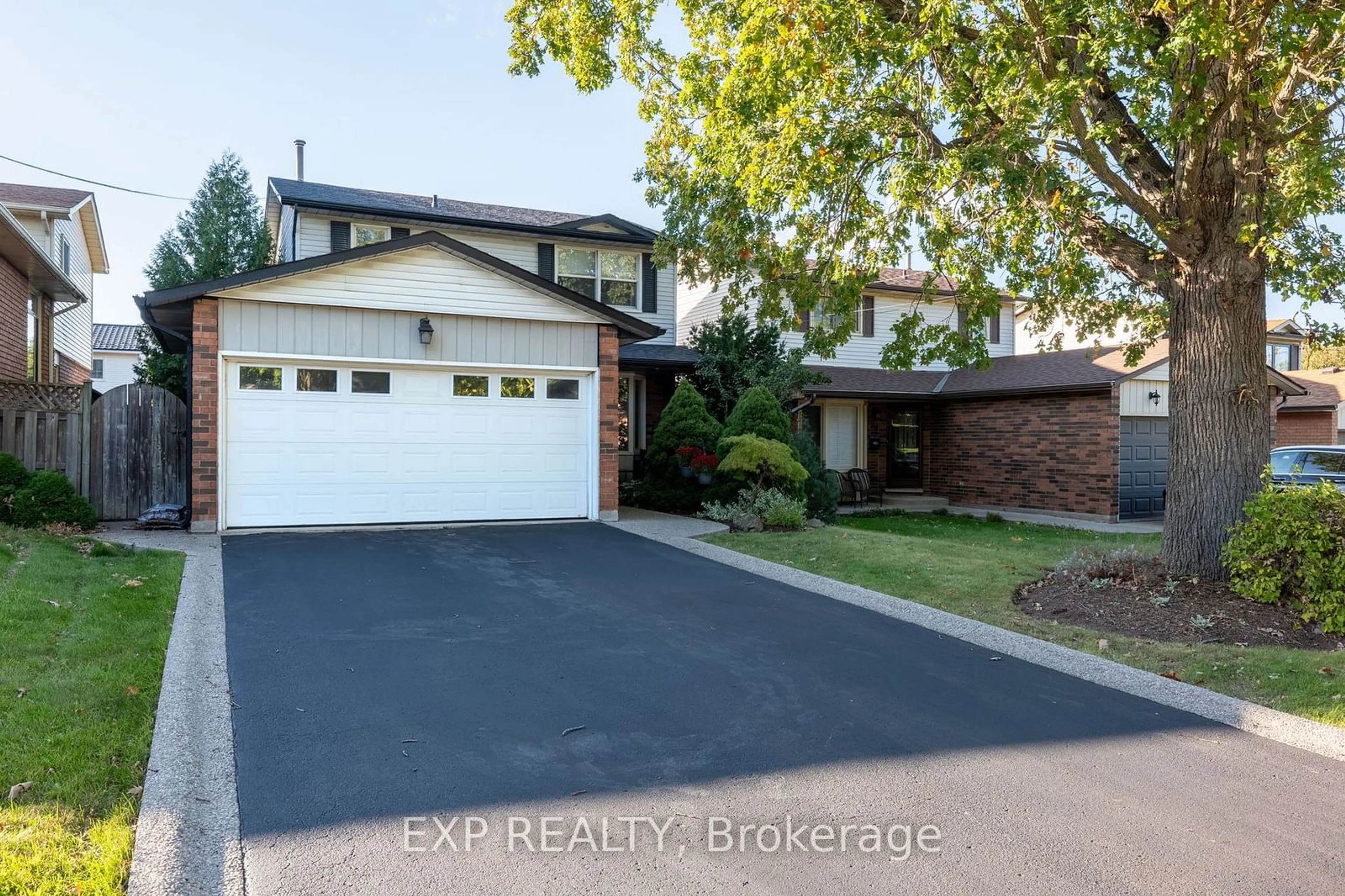 Frontside or backside of a home, the street view for 30 Rosewell St, Hamilton Ontario L8W 2L1