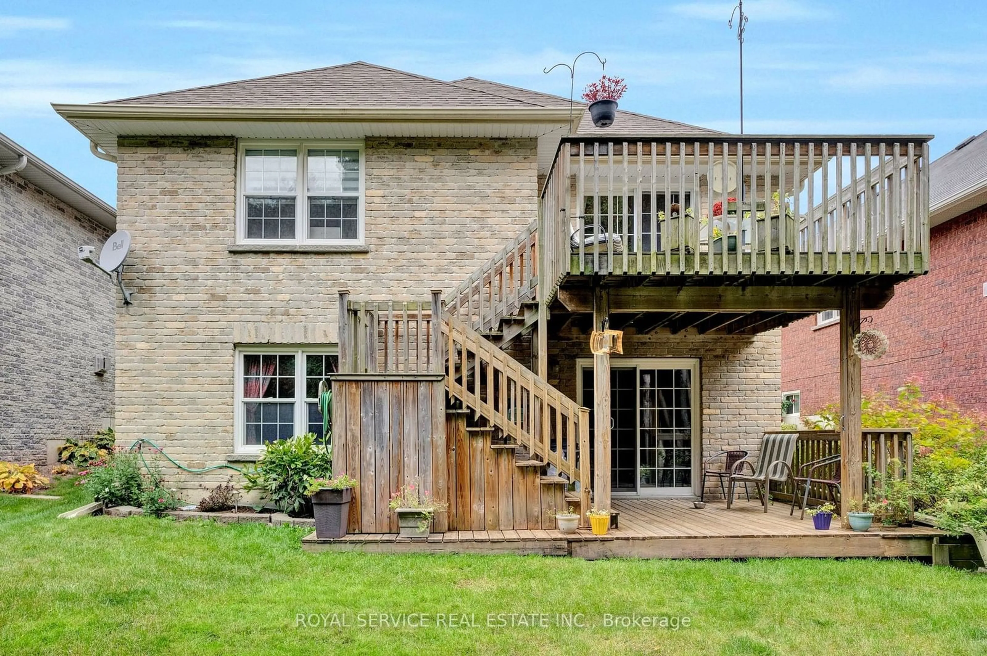 Frontside or backside of a home, the fenced backyard for 92 Laurent Blvd, Kawartha Lakes Ontario K9V 0G8