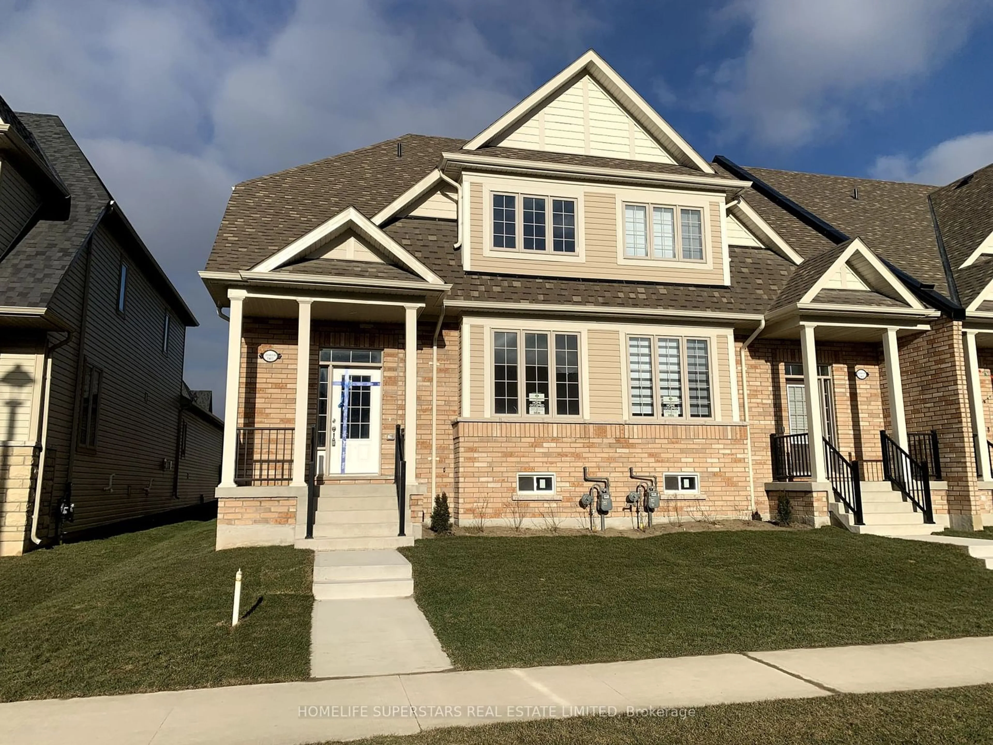 A pic from exterior of the house or condo, the street view for 220 Farley Rd #1, Centre Wellington Ontario N1M 0H6