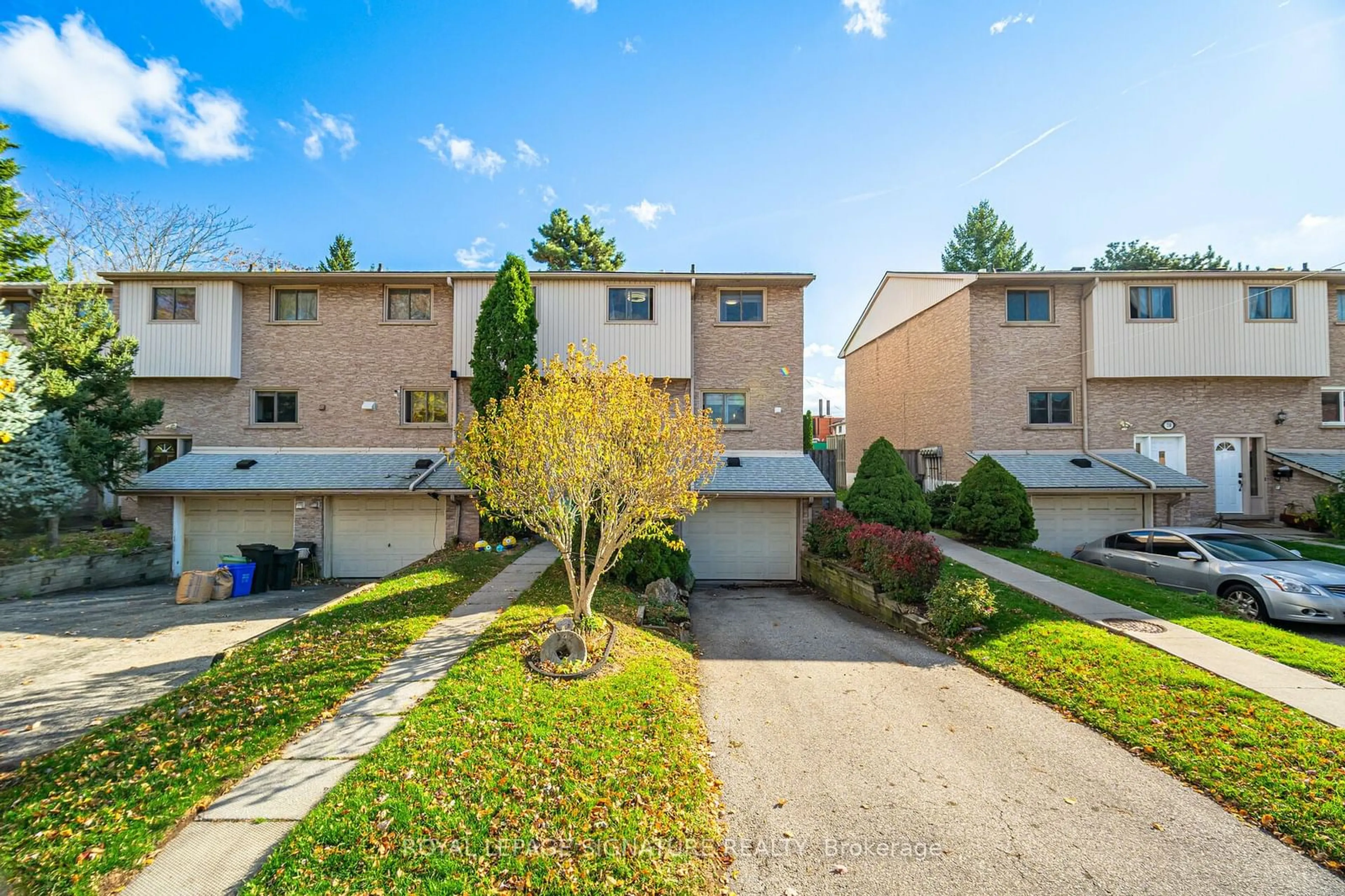 A pic from exterior of the house or condo, the fenced backyard for 342 Catharine St, Hamilton Ontario L8L 8A1