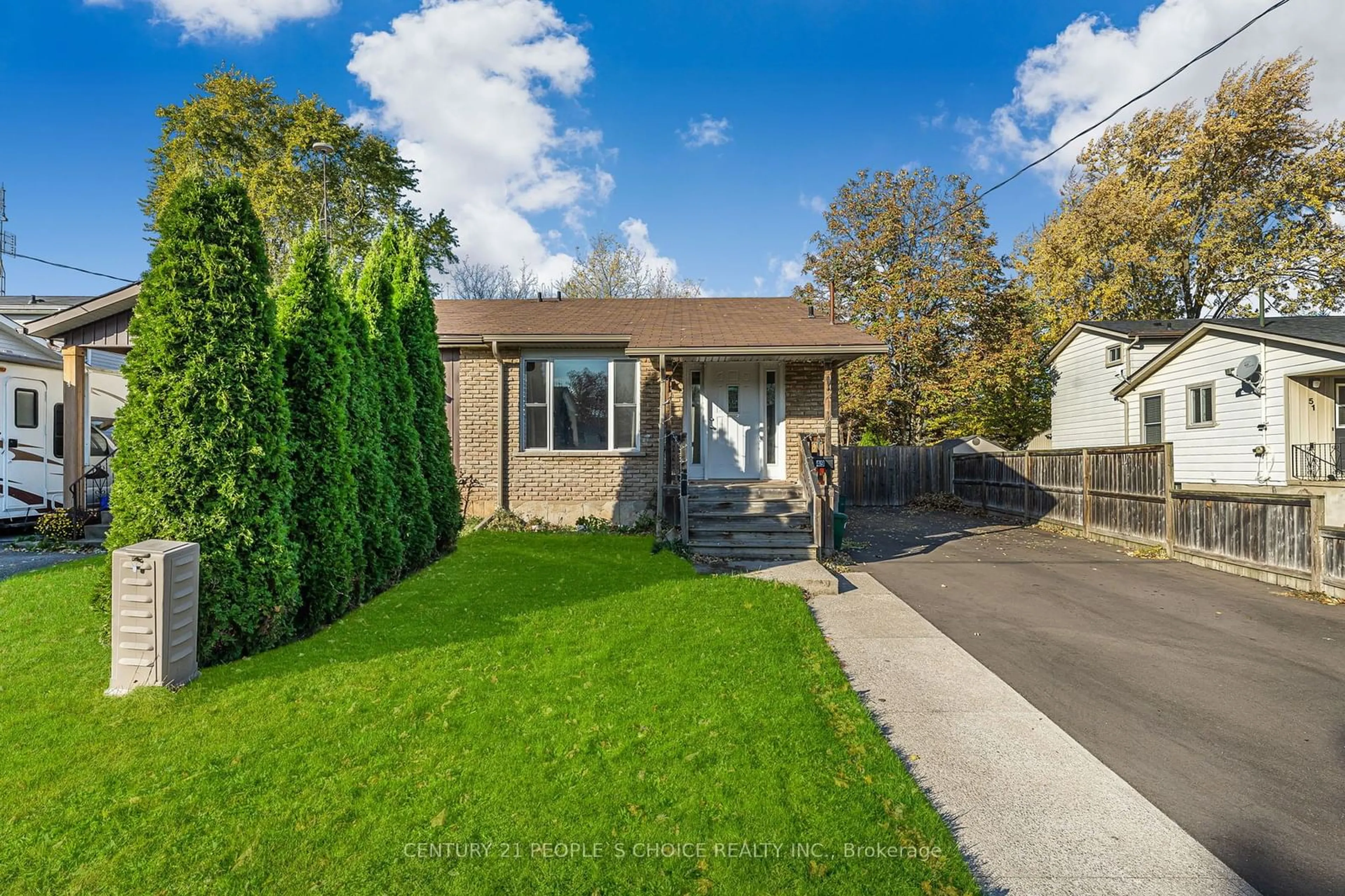 A pic from exterior of the house or condo, the fenced backyard for 49 Hill Park Lane, St. Catharines Ontario L2N 1C5