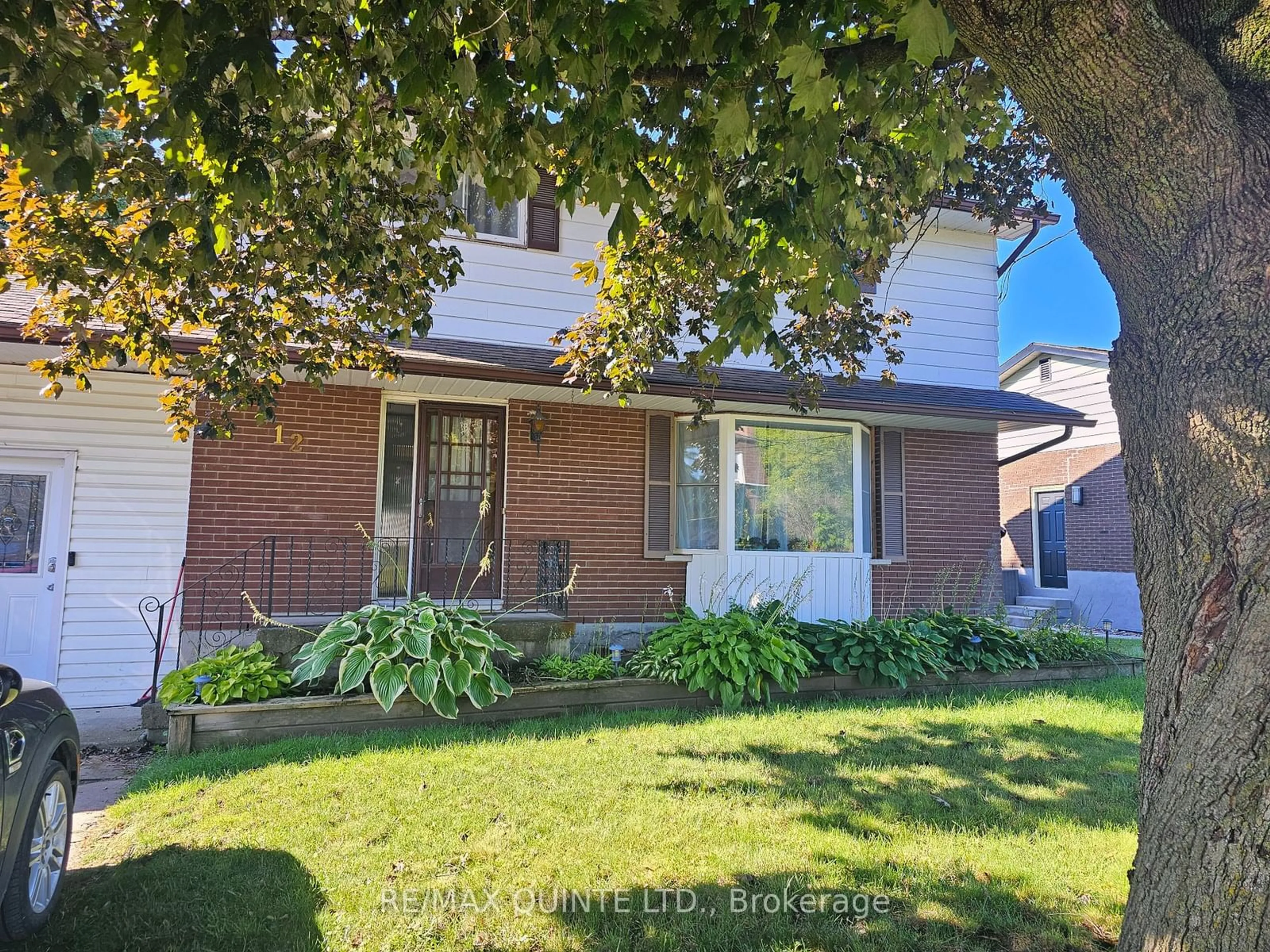 Frontside or backside of a home, the street view for 12 Philip St, Prince Edward County Ontario K0K 2T0