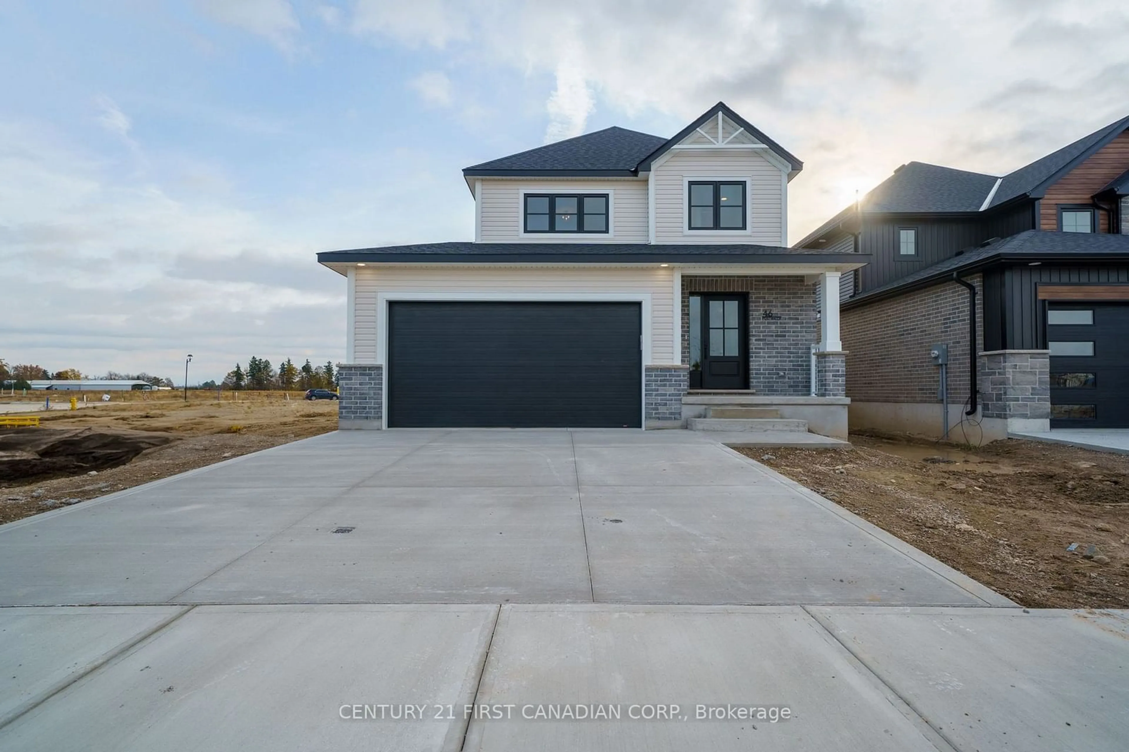 Frontside or backside of a home, the street view for 36 Postma Cres, North Middlesex Ontario N0M 1A0