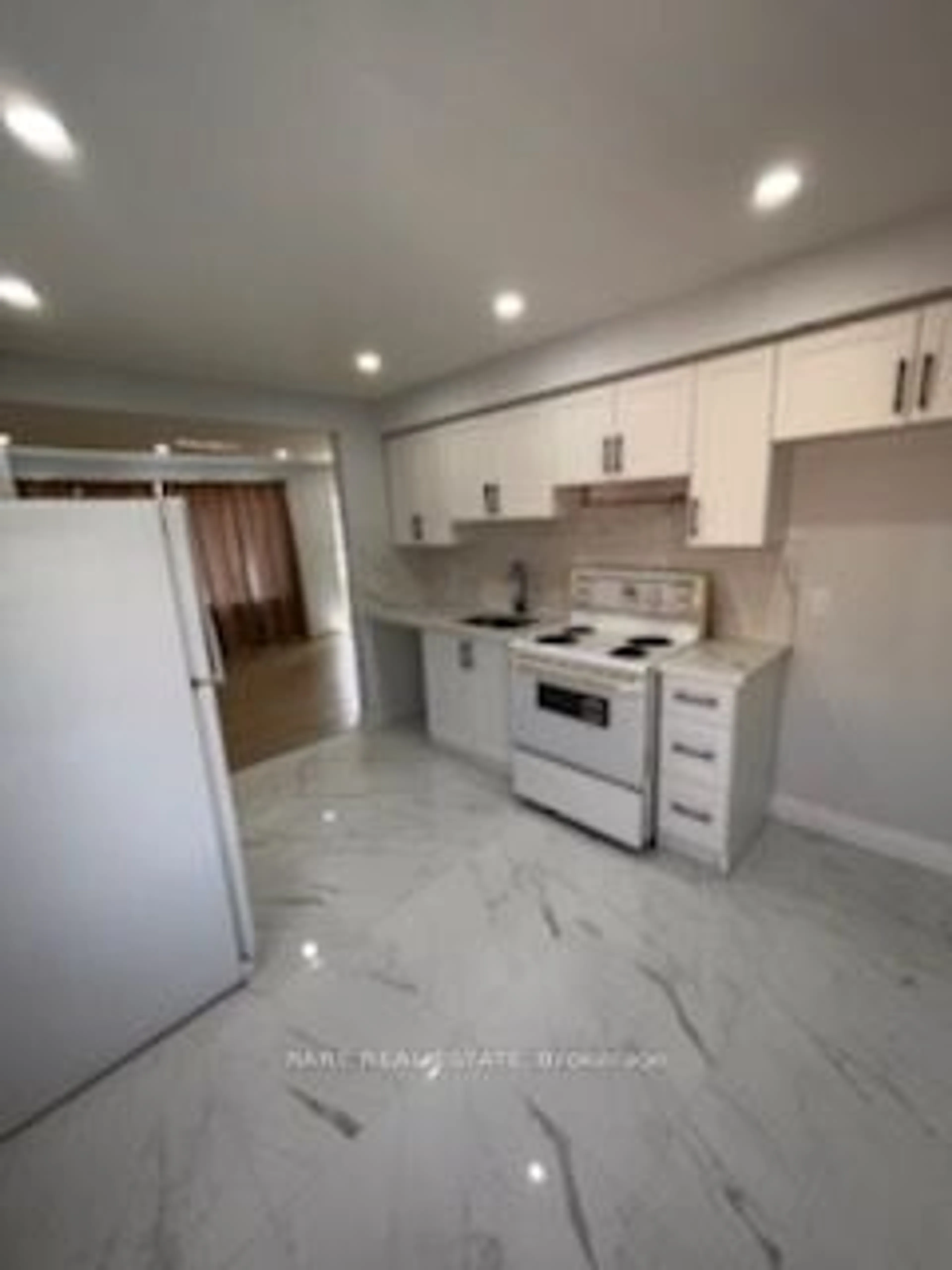 Kitchen, cement floor, cottage for 1942 Duluth Cres, London Ontario N5V 1H7