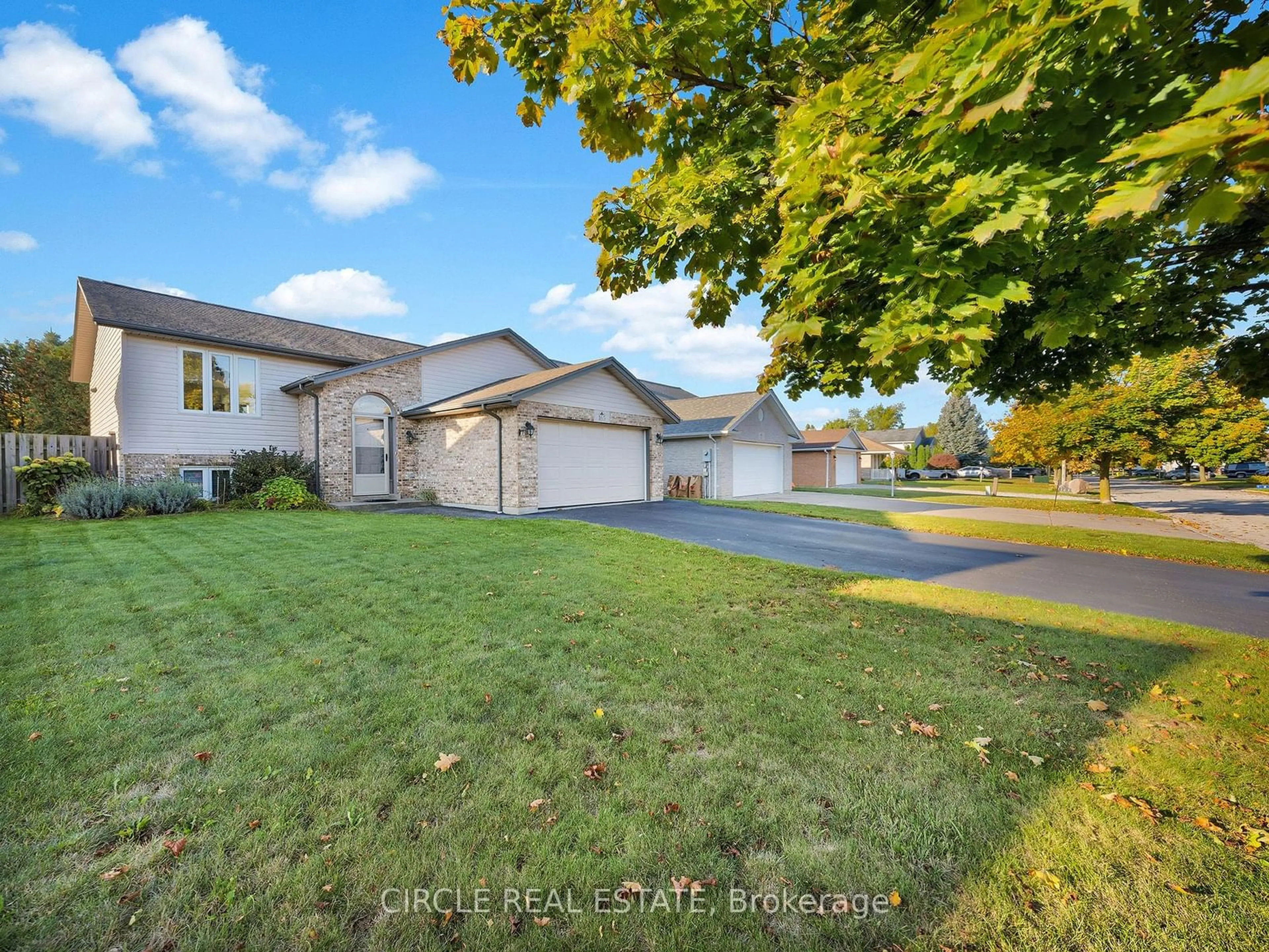 Frontside or backside of a home, the street view for 165 Mediterranean Ave, Amherstburg Ontario N9V 3X9