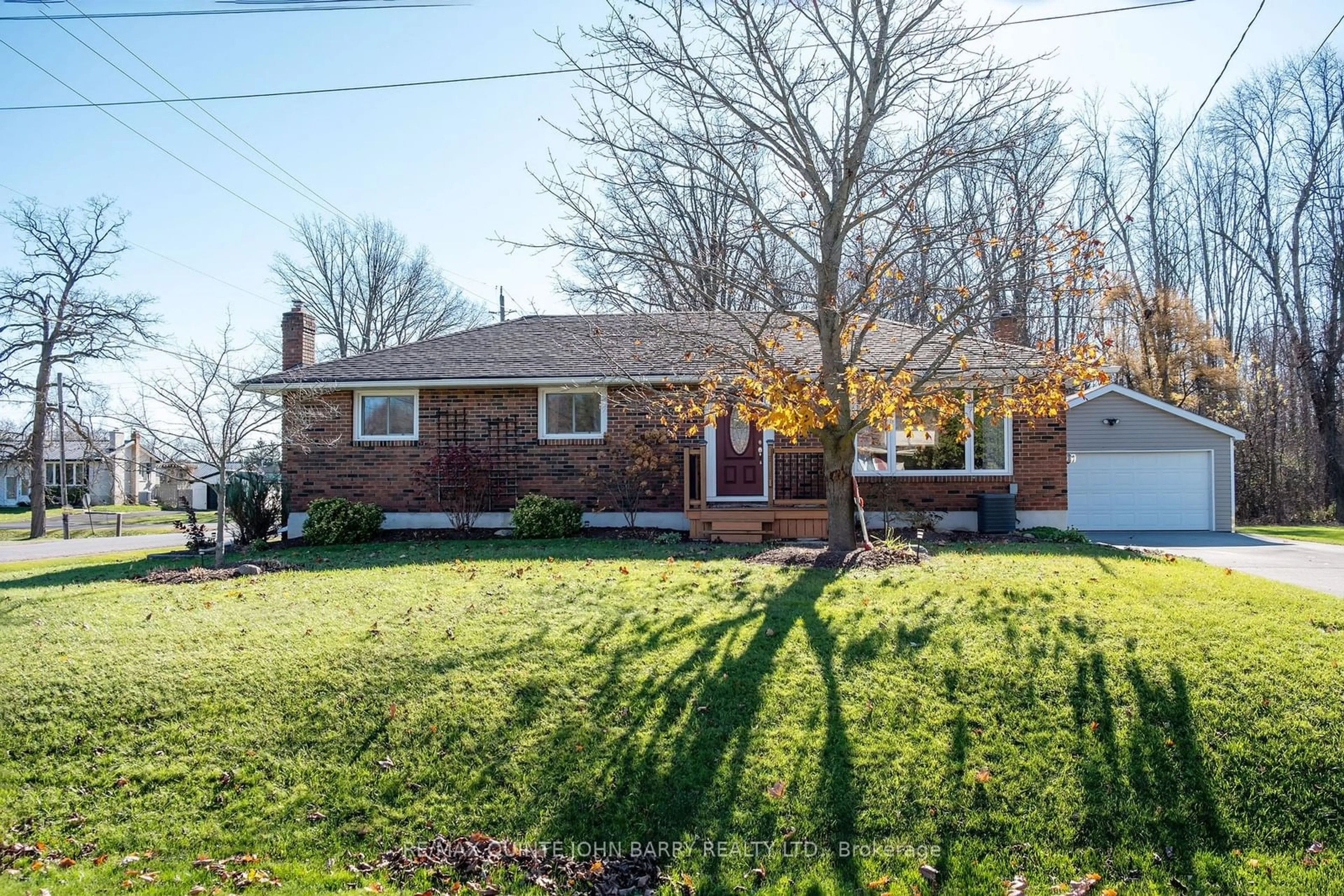 Frontside or backside of a home, the fenced backyard for 35 Anne St, Quinte West Ontario K8V 0M3