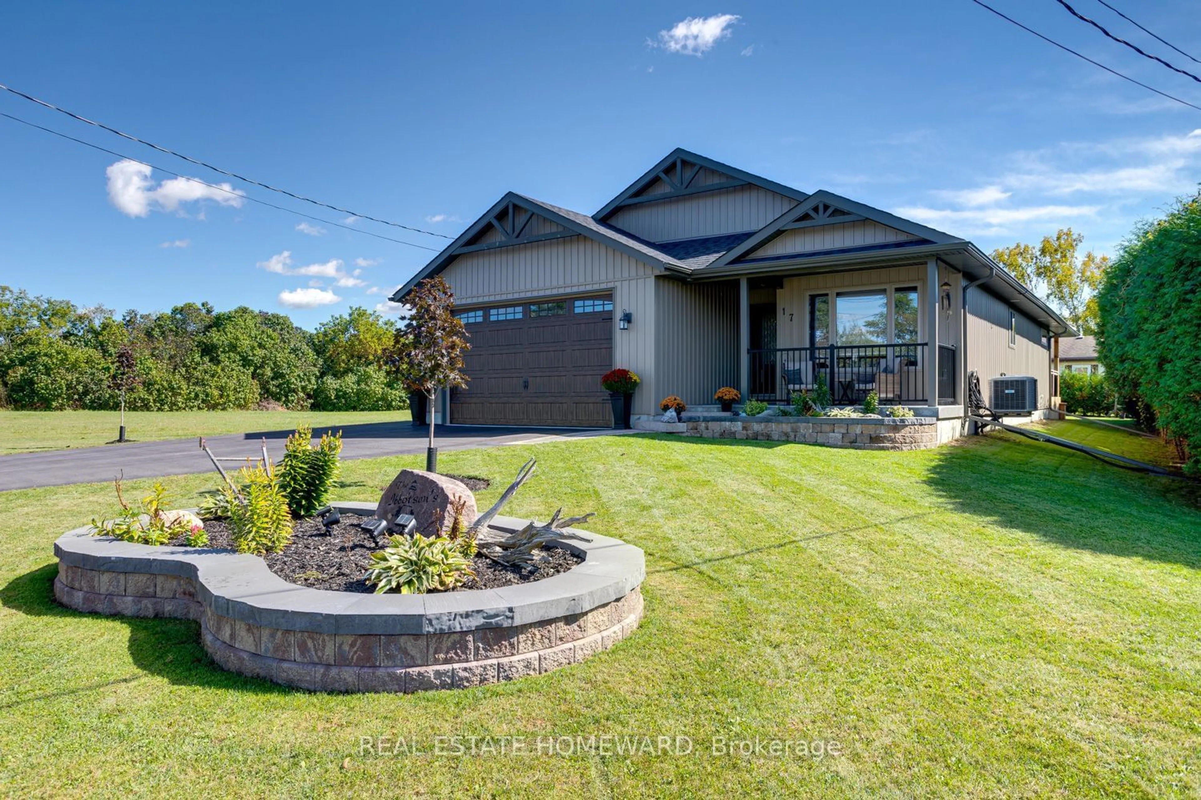 Frontside or backside of a home, the fenced backyard for 17 Elgin St, Brighton Ontario K0K 1H0