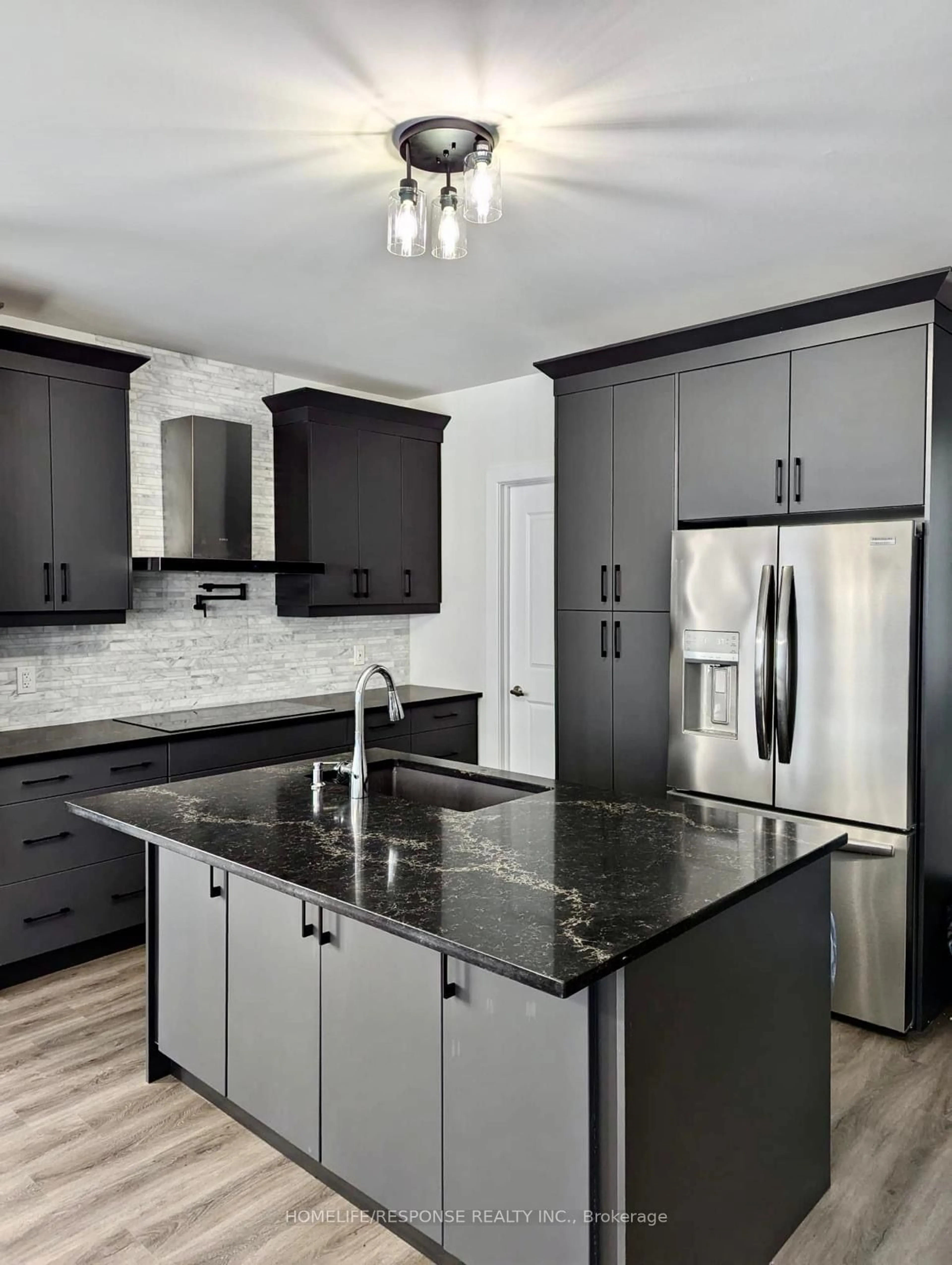 Contemporary kitchen, wood floors for 714 Daimler Pkwy, Welland Ontario L3B 0H2