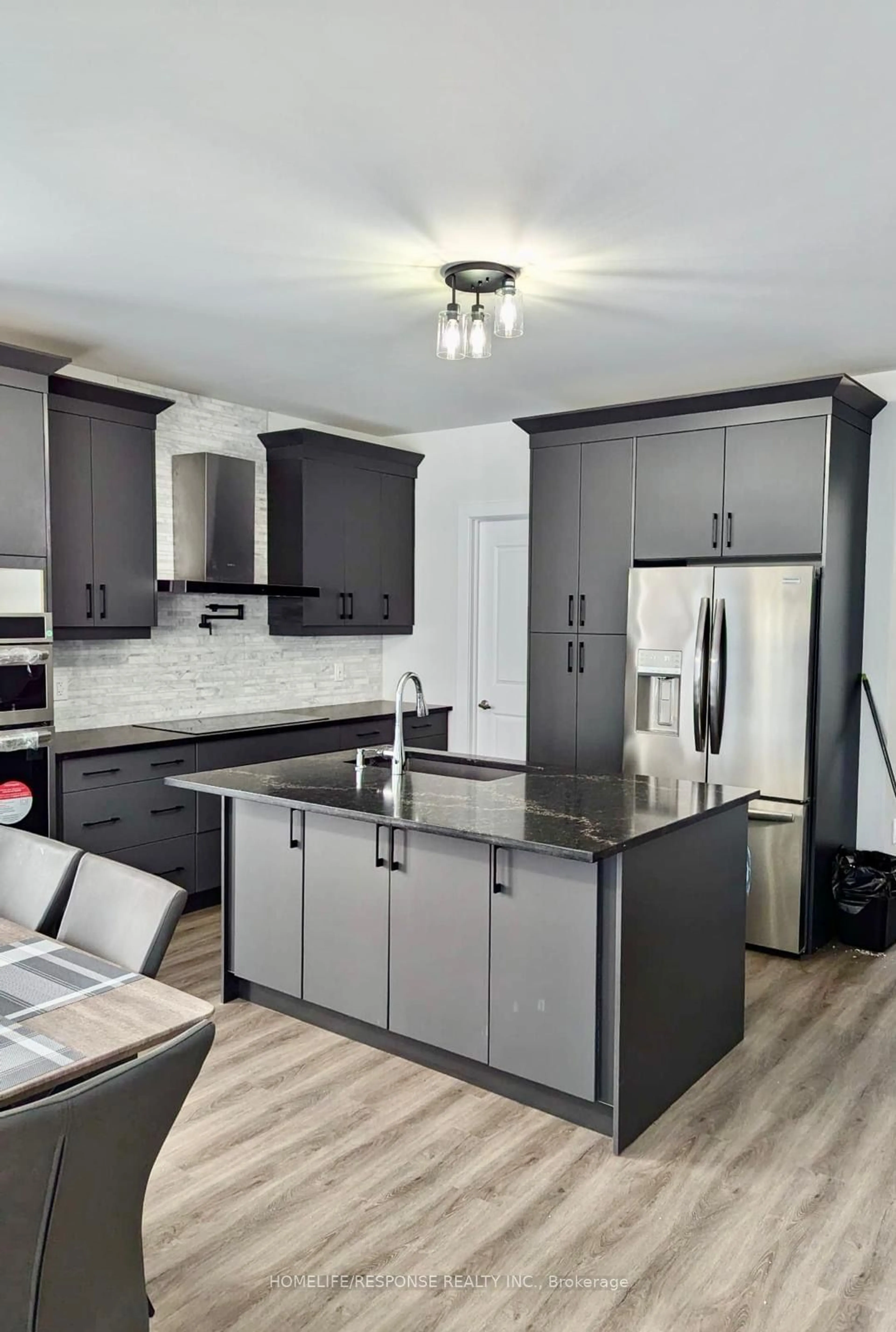 Contemporary kitchen, wood floors, cottage for 714 Daimler Pkwy, Welland Ontario L3B 0H2