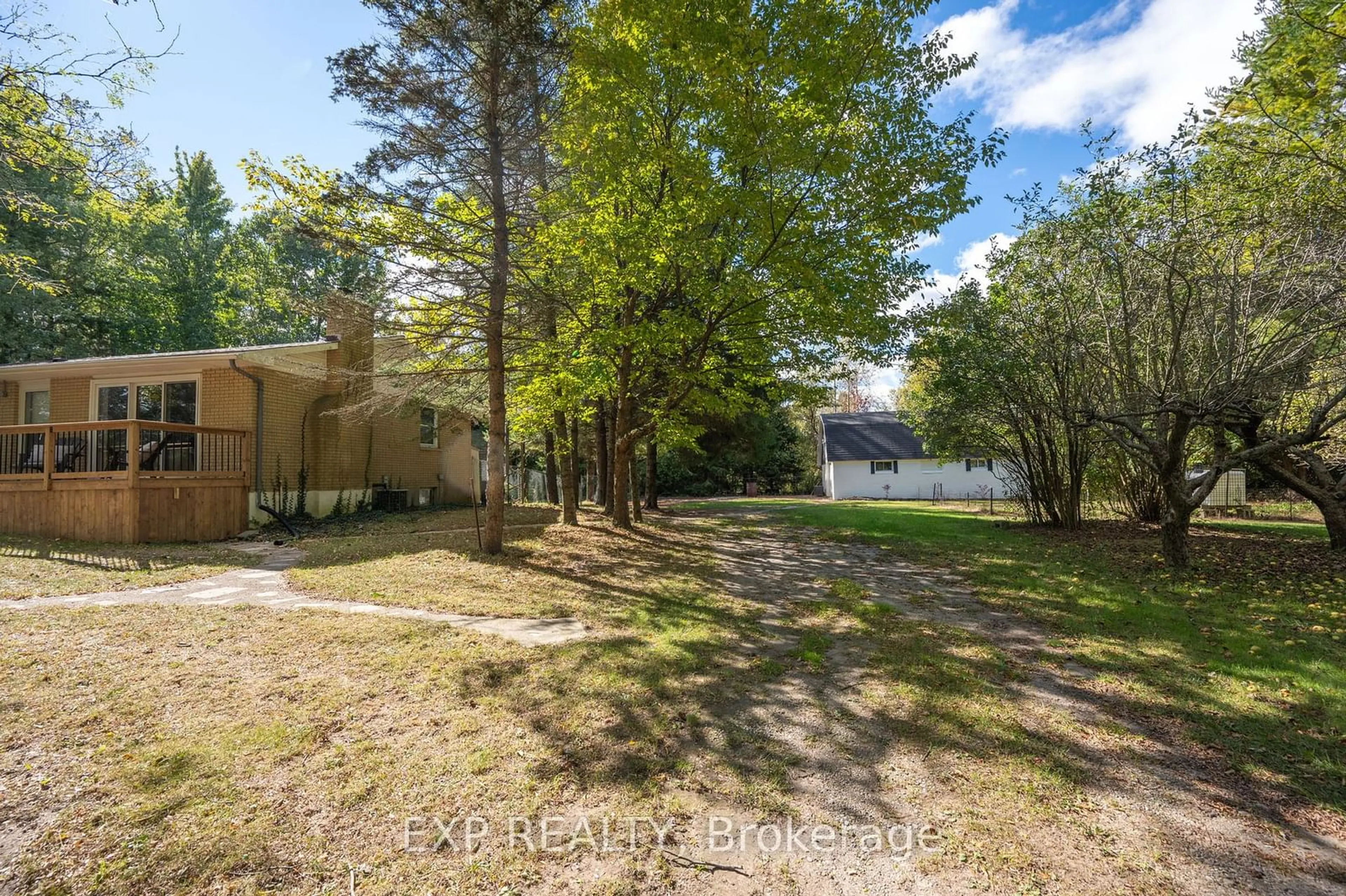 A pic from exterior of the house or condo, the fenced backyard for 23243 Melbourne Rd, Southwest Middlesex Ontario N0L 1T0