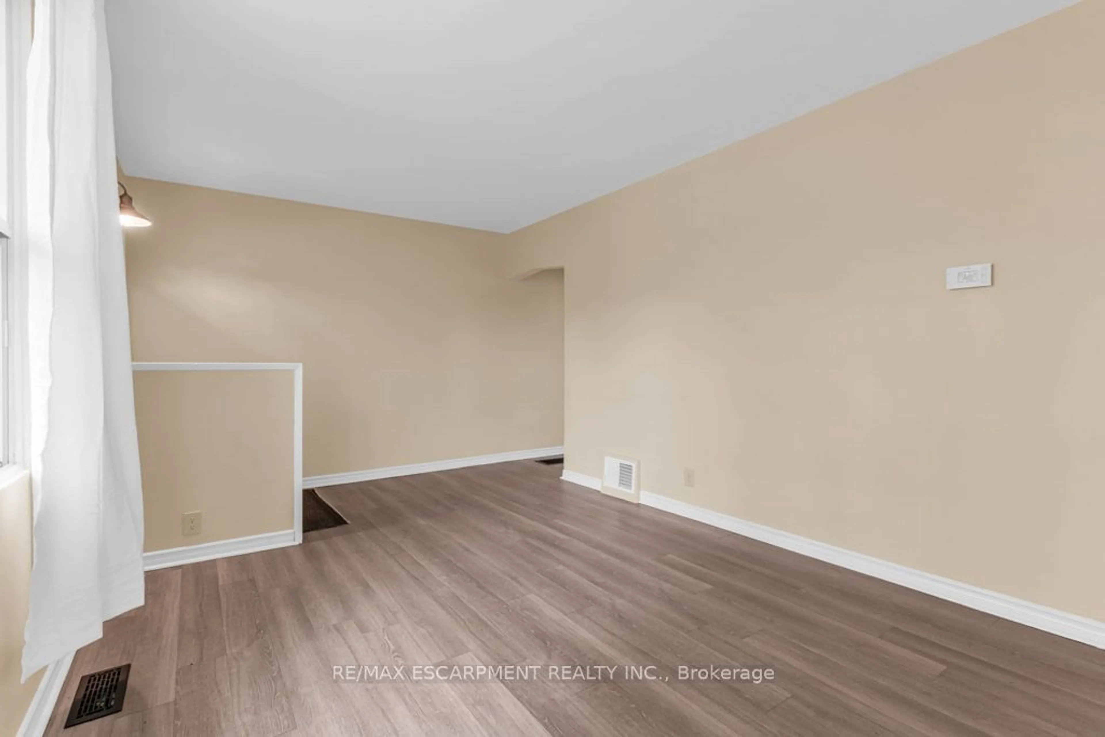 A pic of a room, wood floors for 34 SUMACH St, Hamilton Ontario L8H 6P8