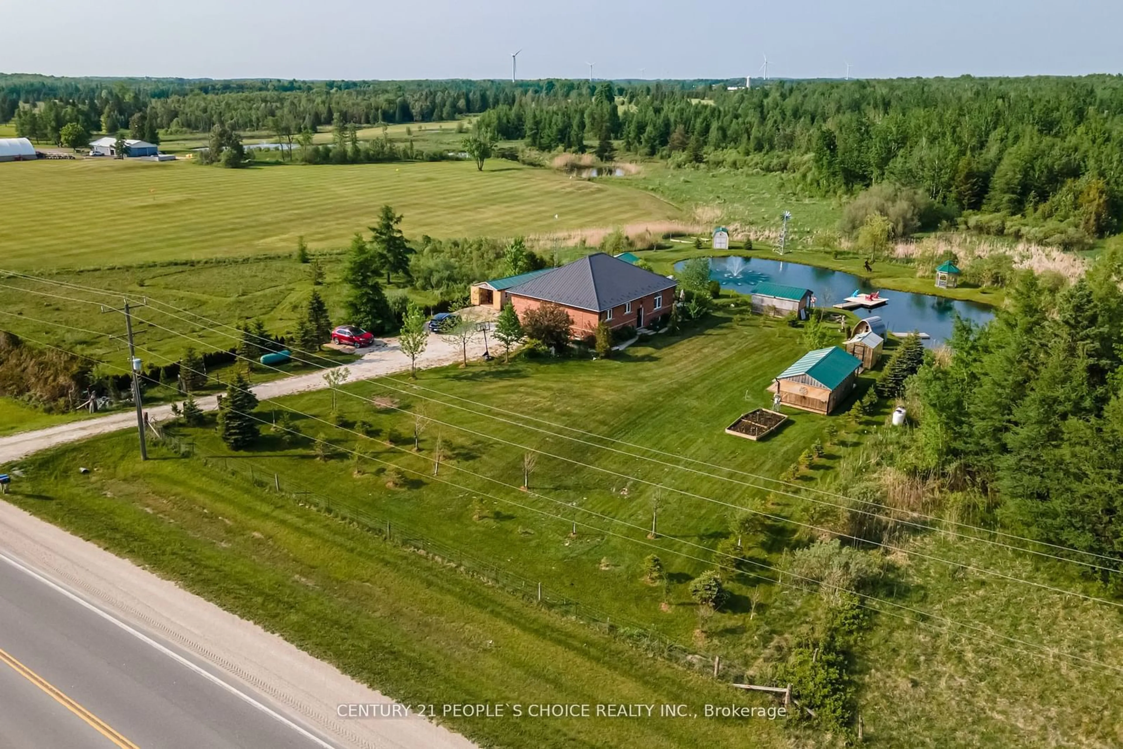 Frontside or backside of a home, the fenced backyard for 159265 Highway 10, Melancthon Ontario L9V 2G4