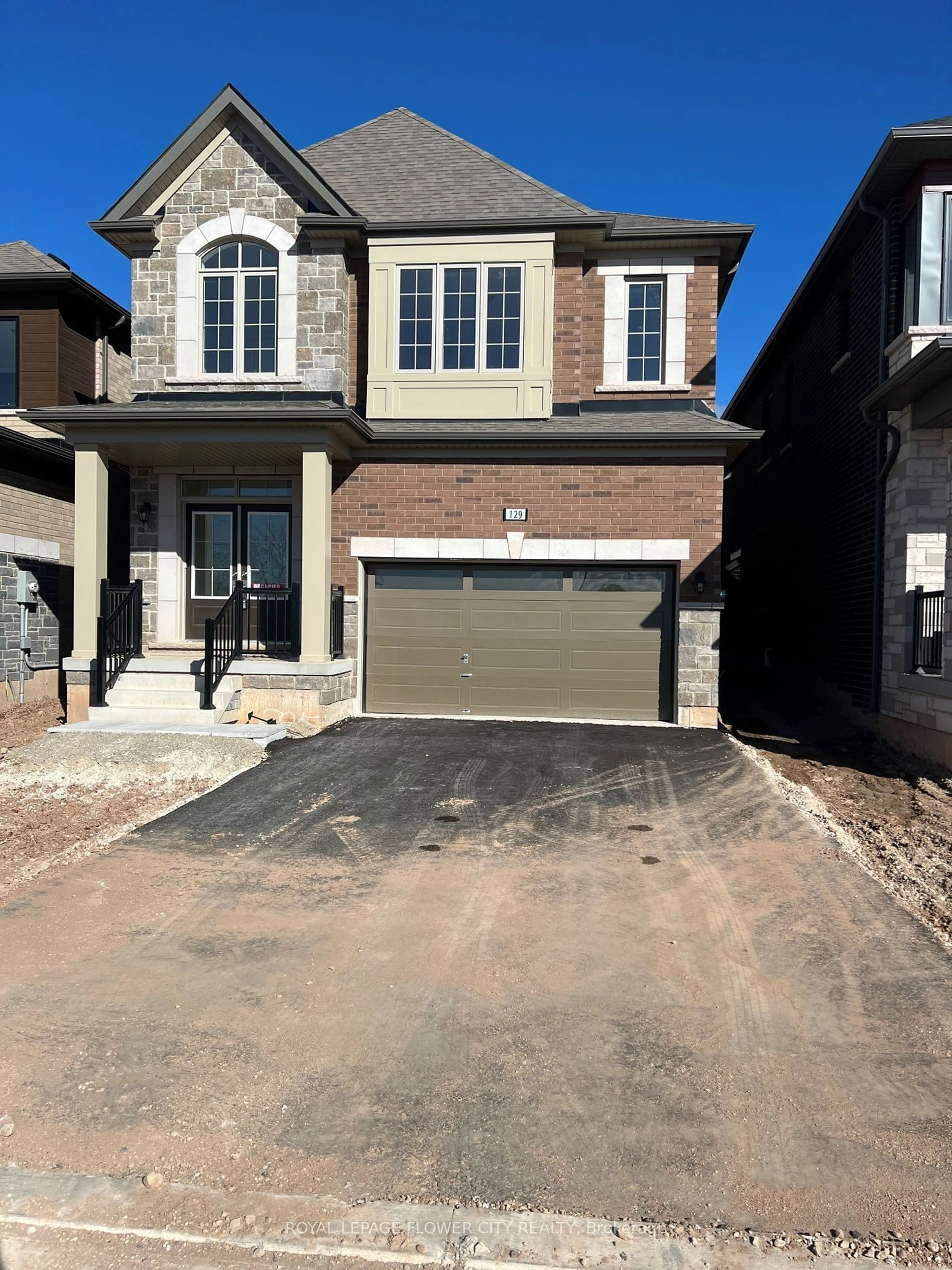 Home with brick exterior material for 129 Henshaw Dr, Erin Ontario N0B 1T0